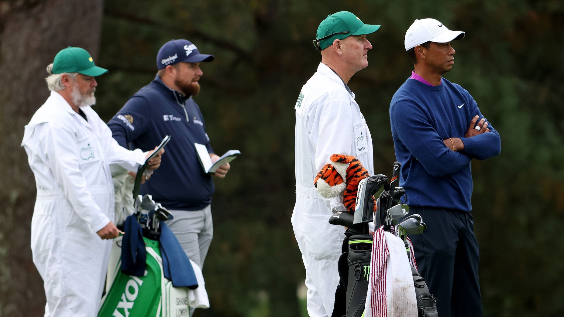 Brian “Bo” Martin, Shane Lowry, Joe LaCava and Tiger Woods