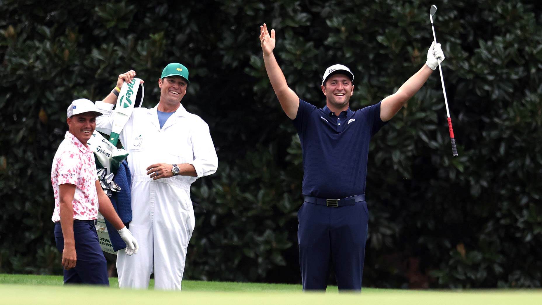 jon rahm celebrates making a hole-in-one