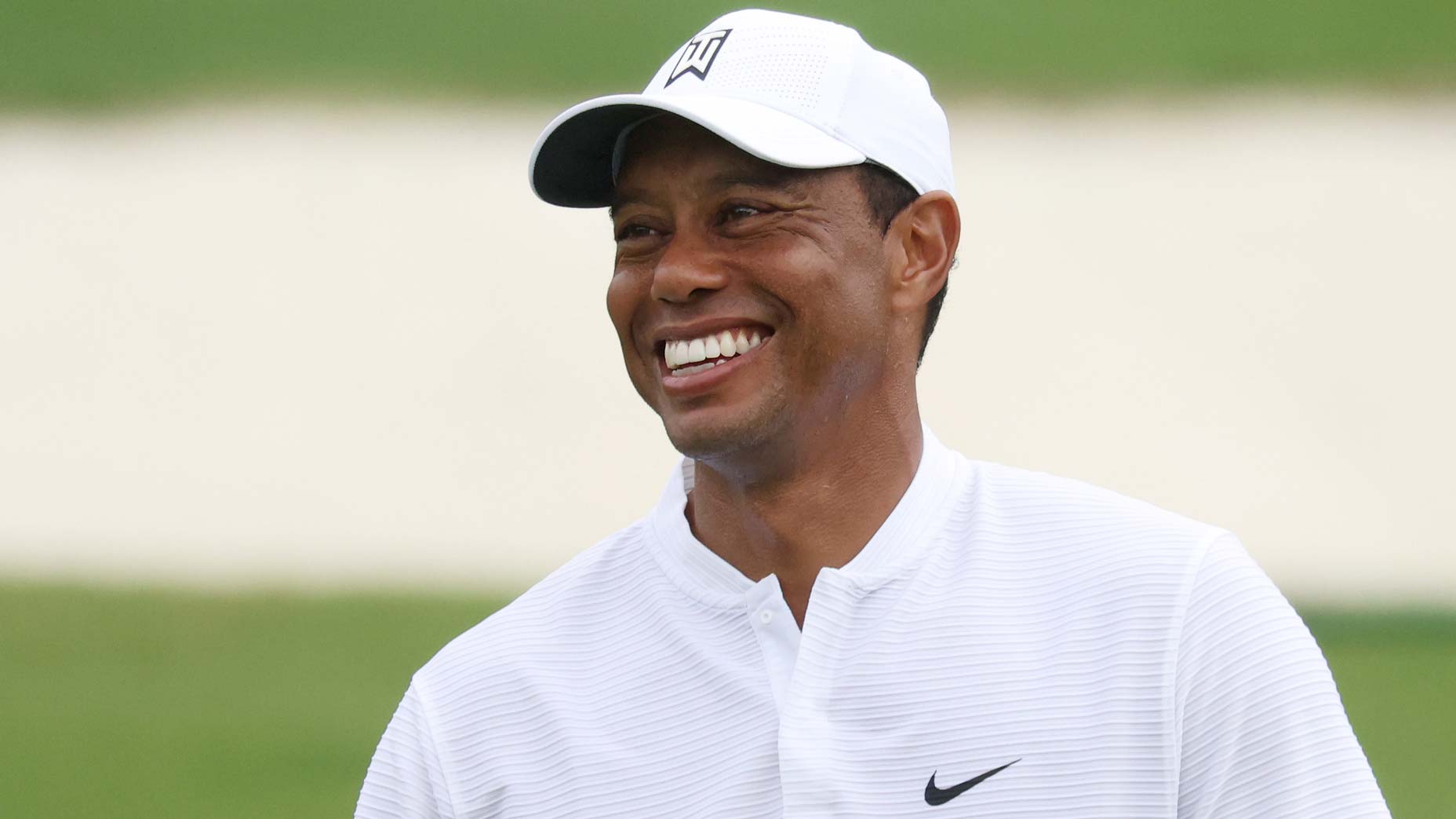 tiger woods smiles