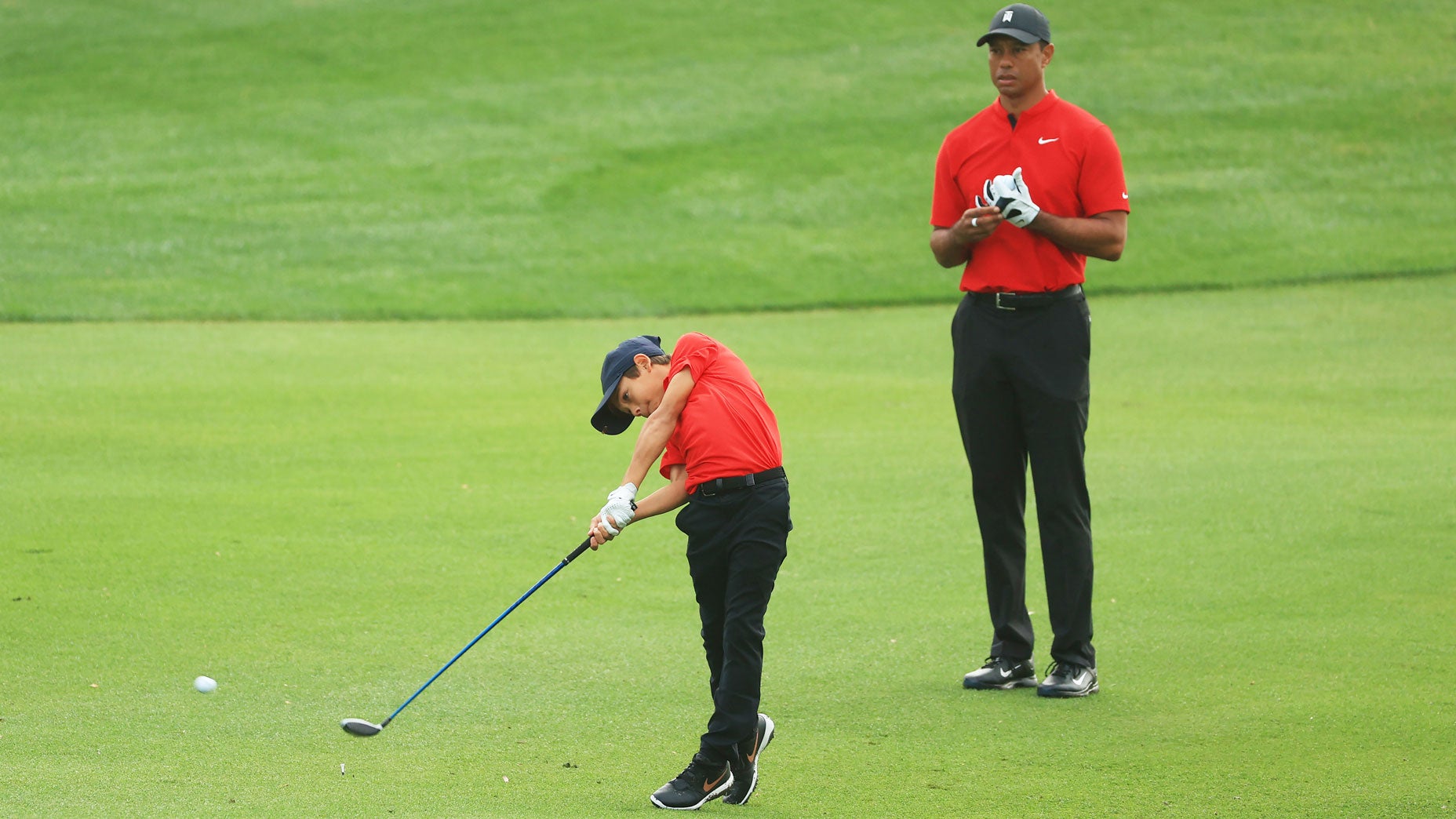 Charlie Woods and Tiger Woods