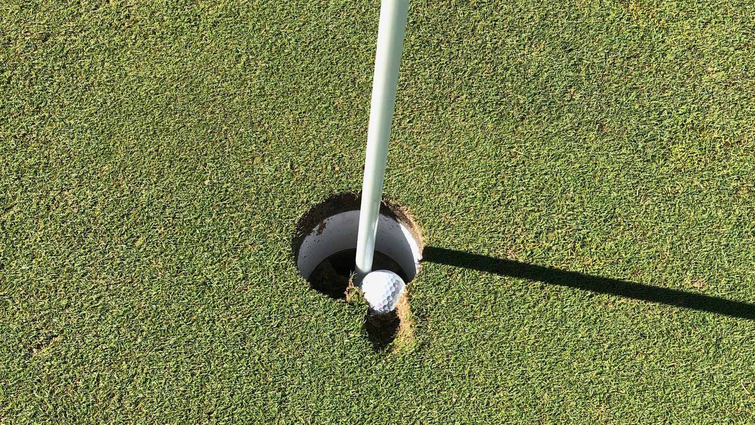 Does this embedded ball count as a hole-in-one?