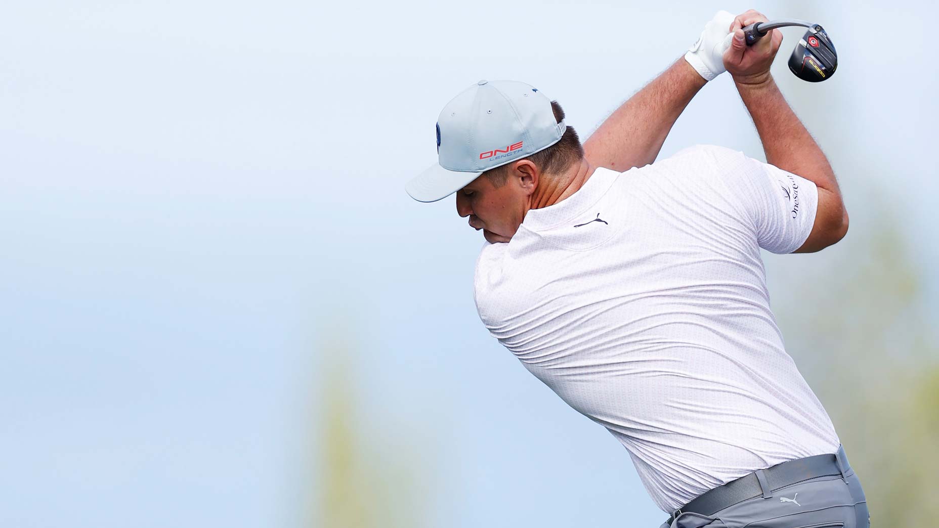 bryson dechambeau hits ball