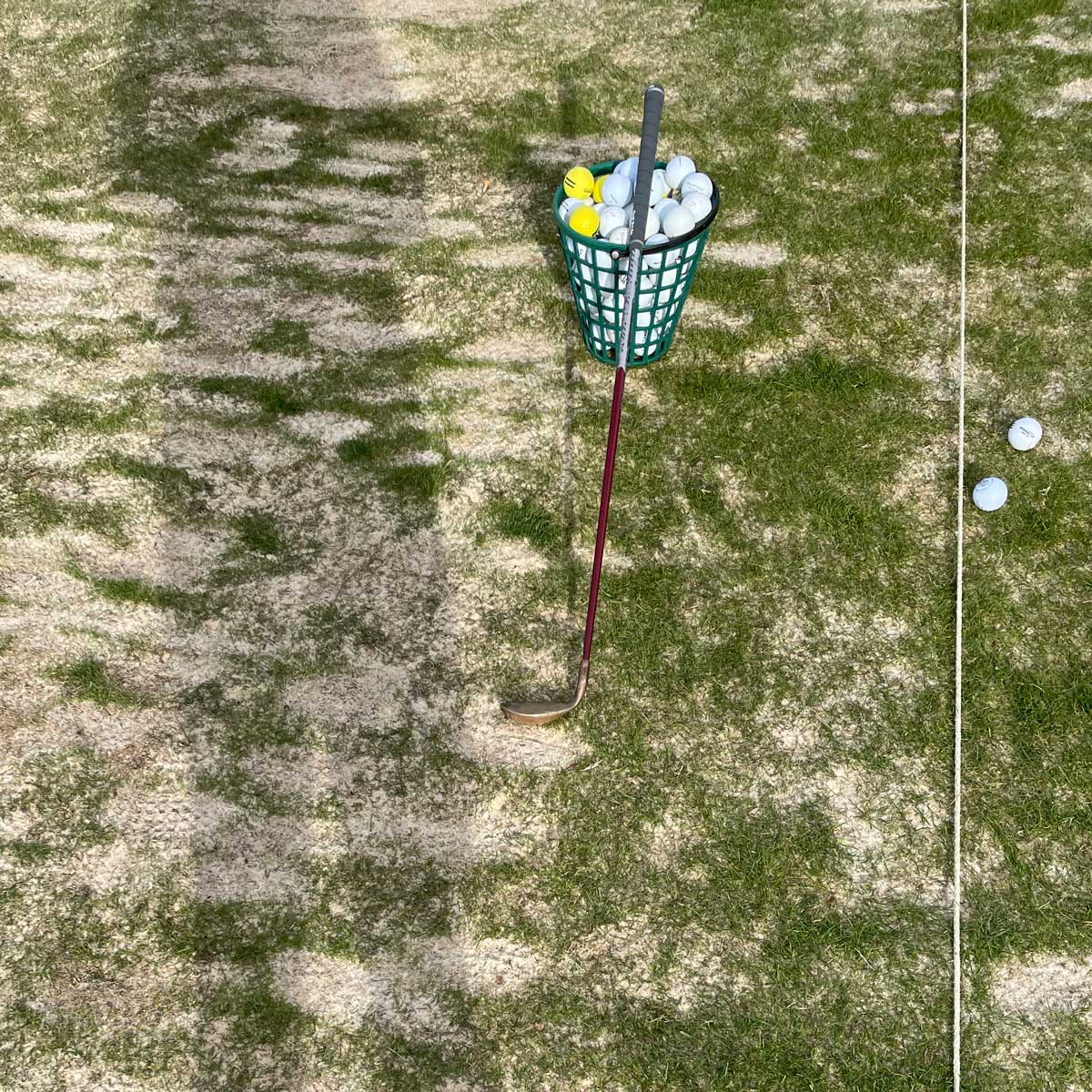 a bucket of range balls at the patch