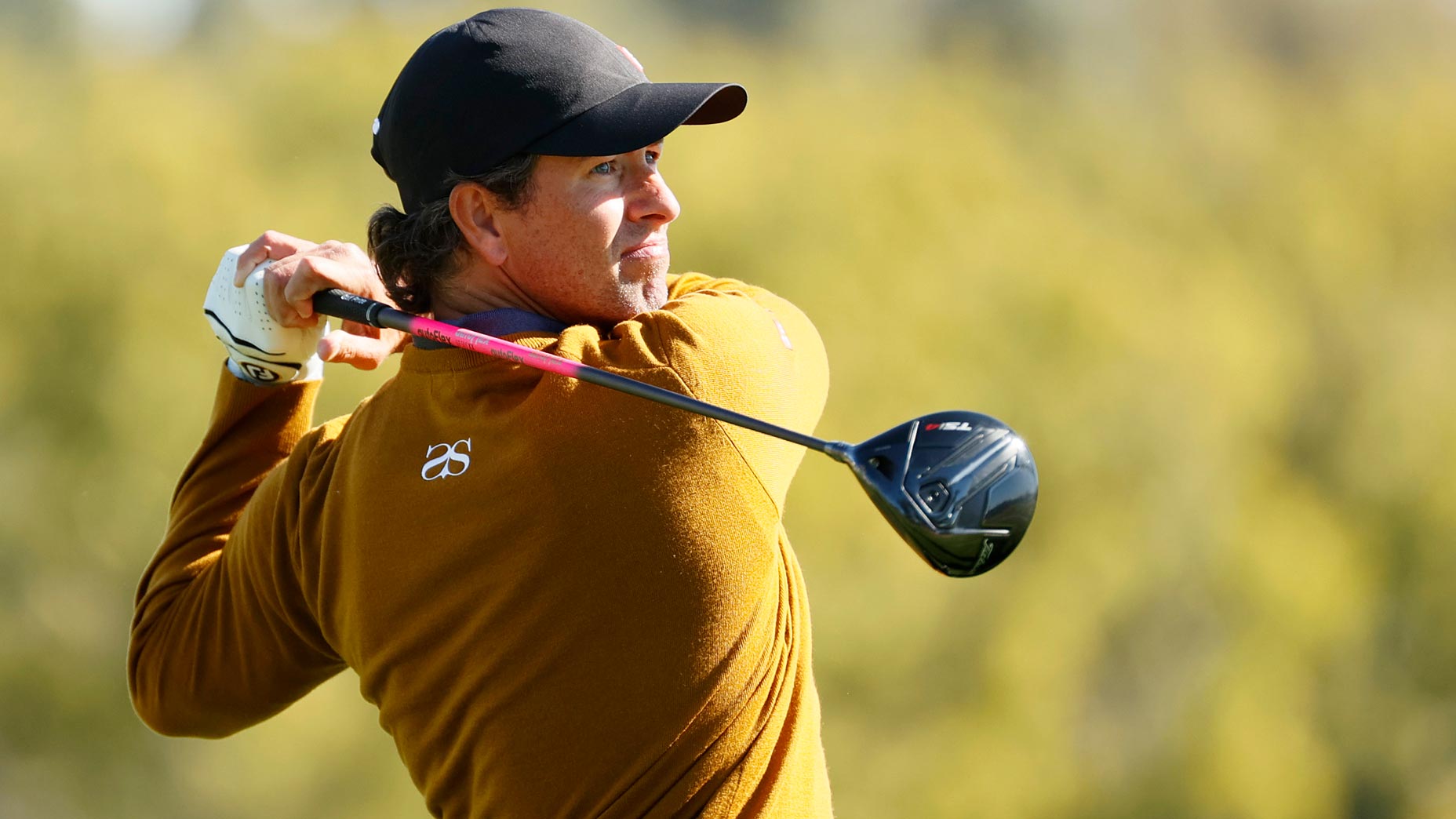 Adam Scott's hair is turning heads.