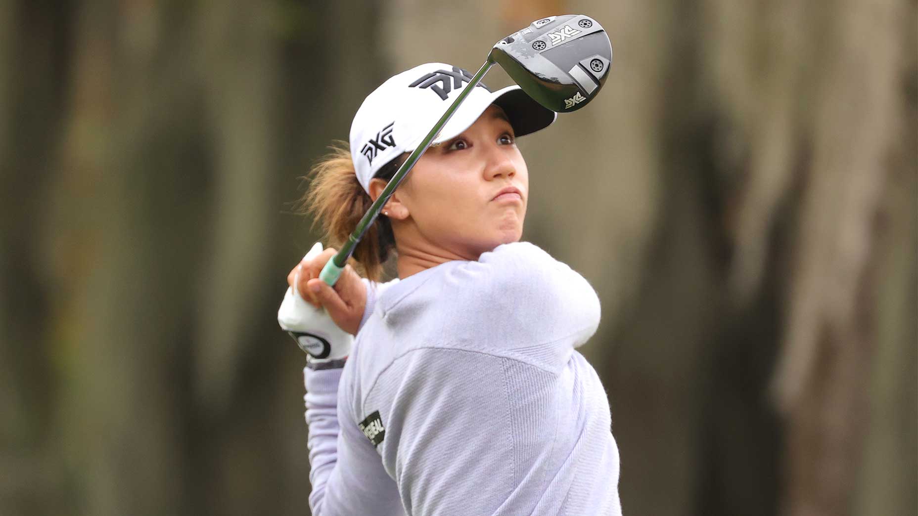 Lydia Ko watches a tee shot.