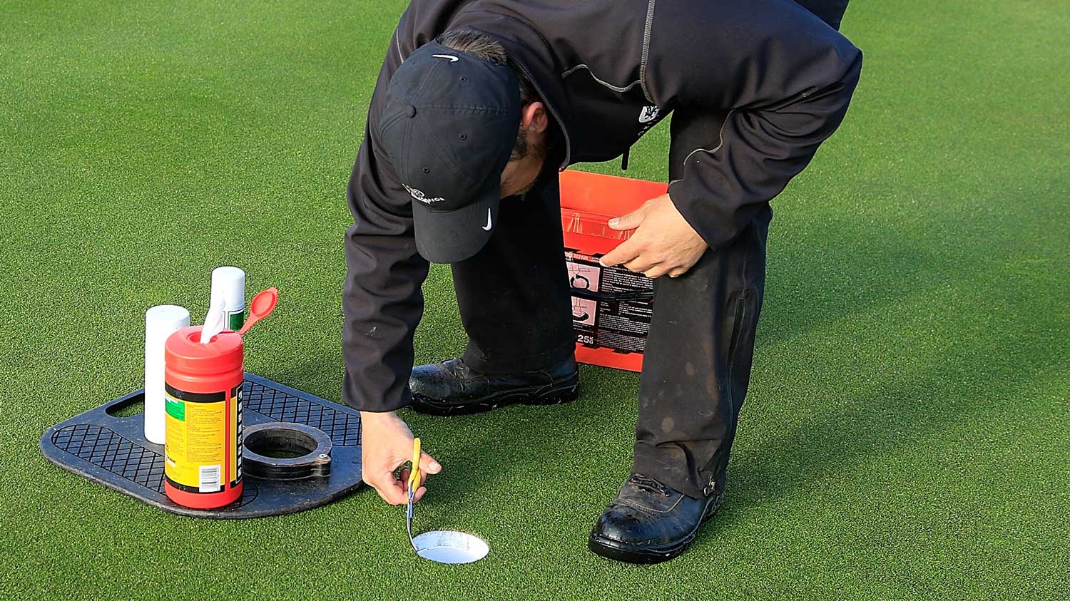 cutting a golf hole