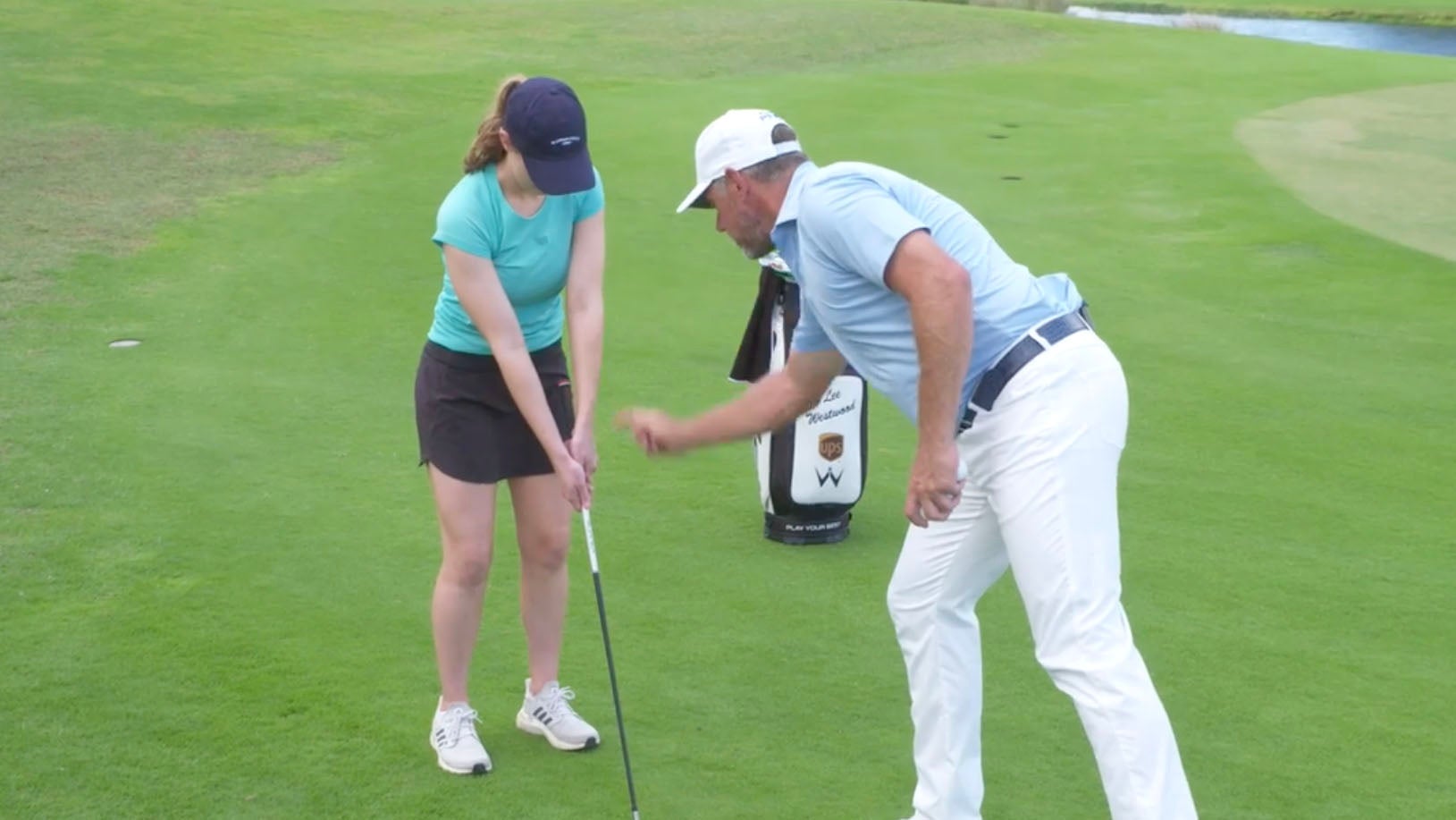Lee Westwood giving a lesson