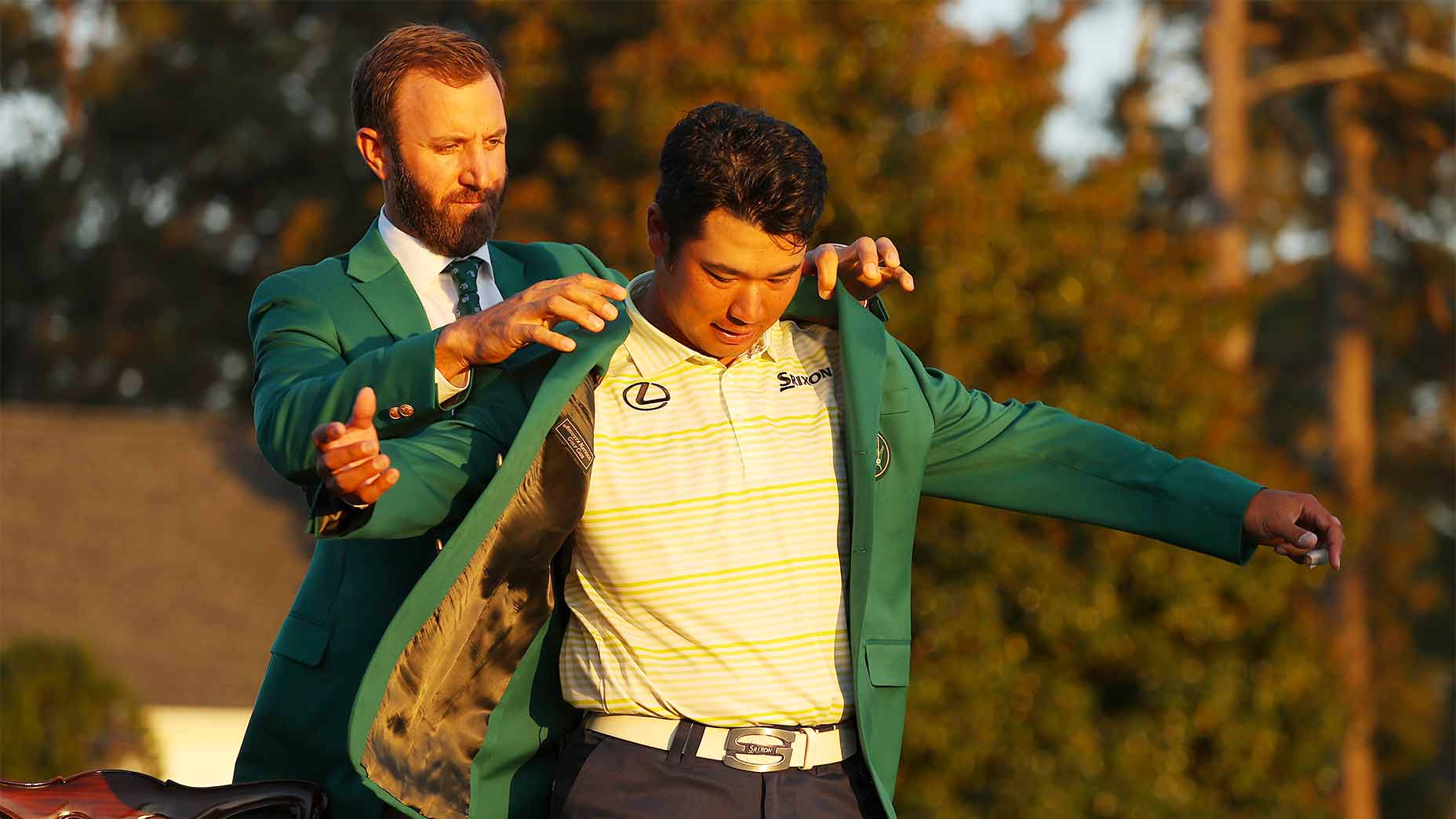 Dustin johnson puts the green jacket on hideki matsuyama