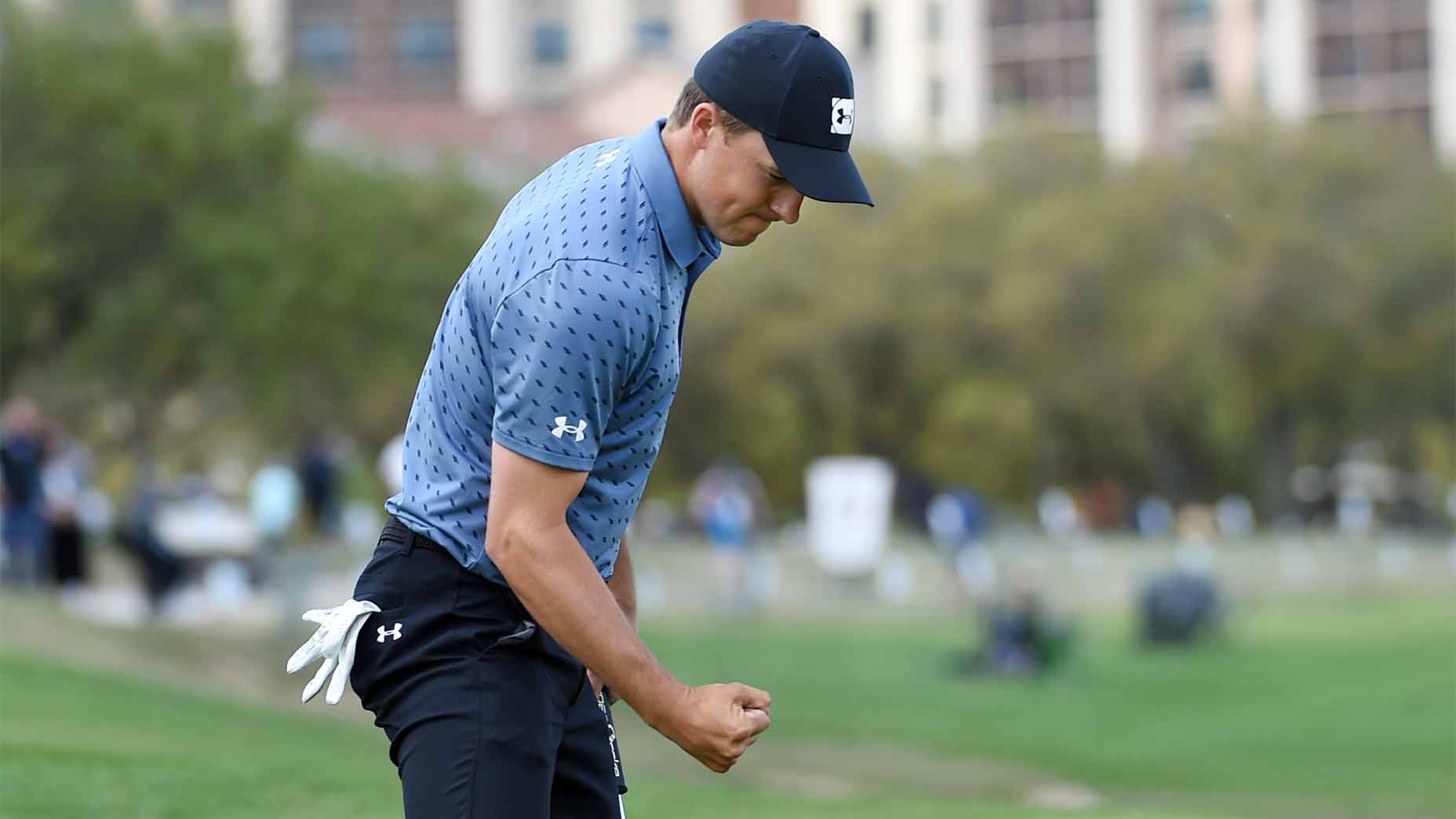 Jordan Spieth pumps his fist after winning the Valero Texas Open.