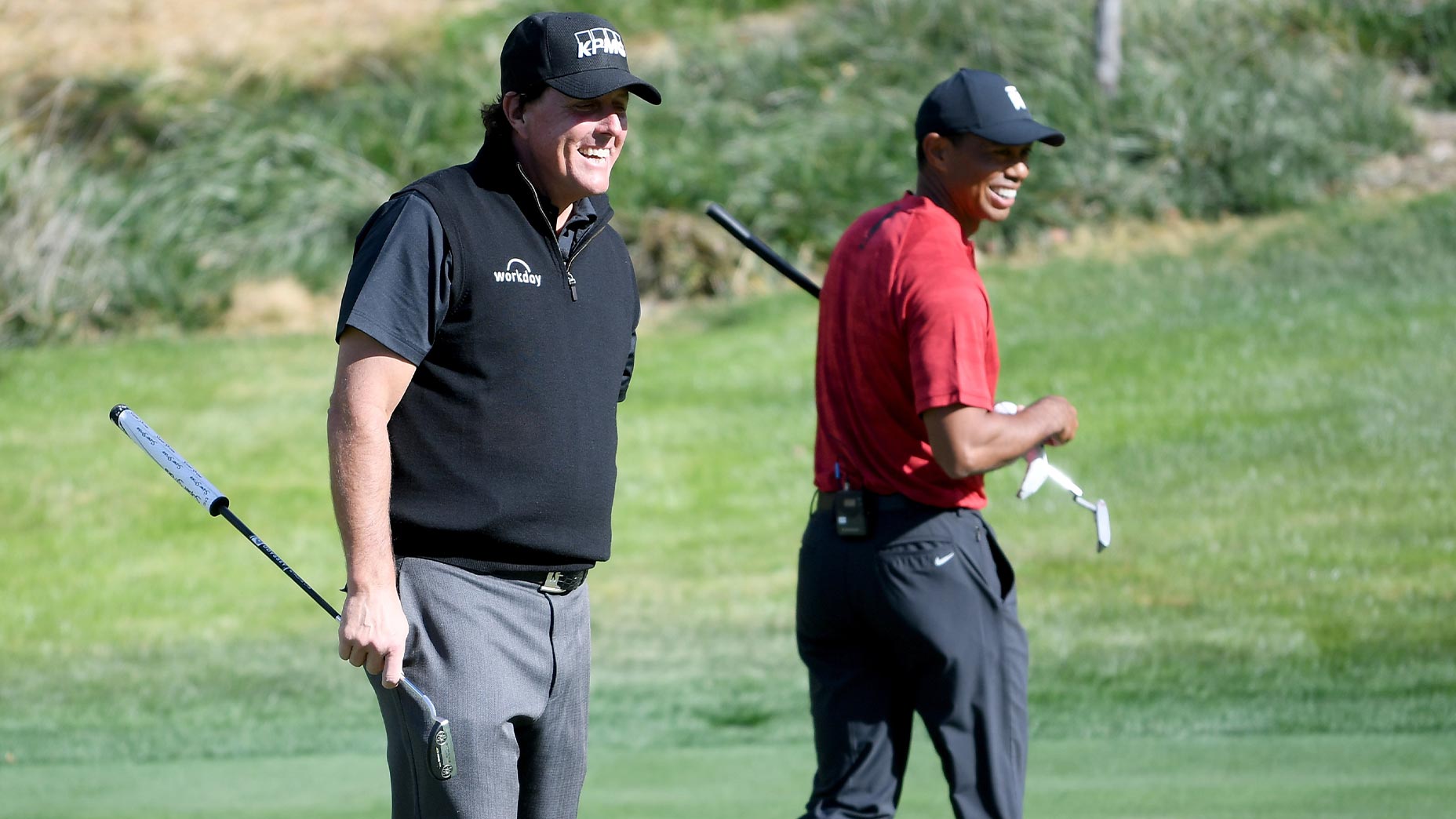 tiger woods and phil mickelson smile