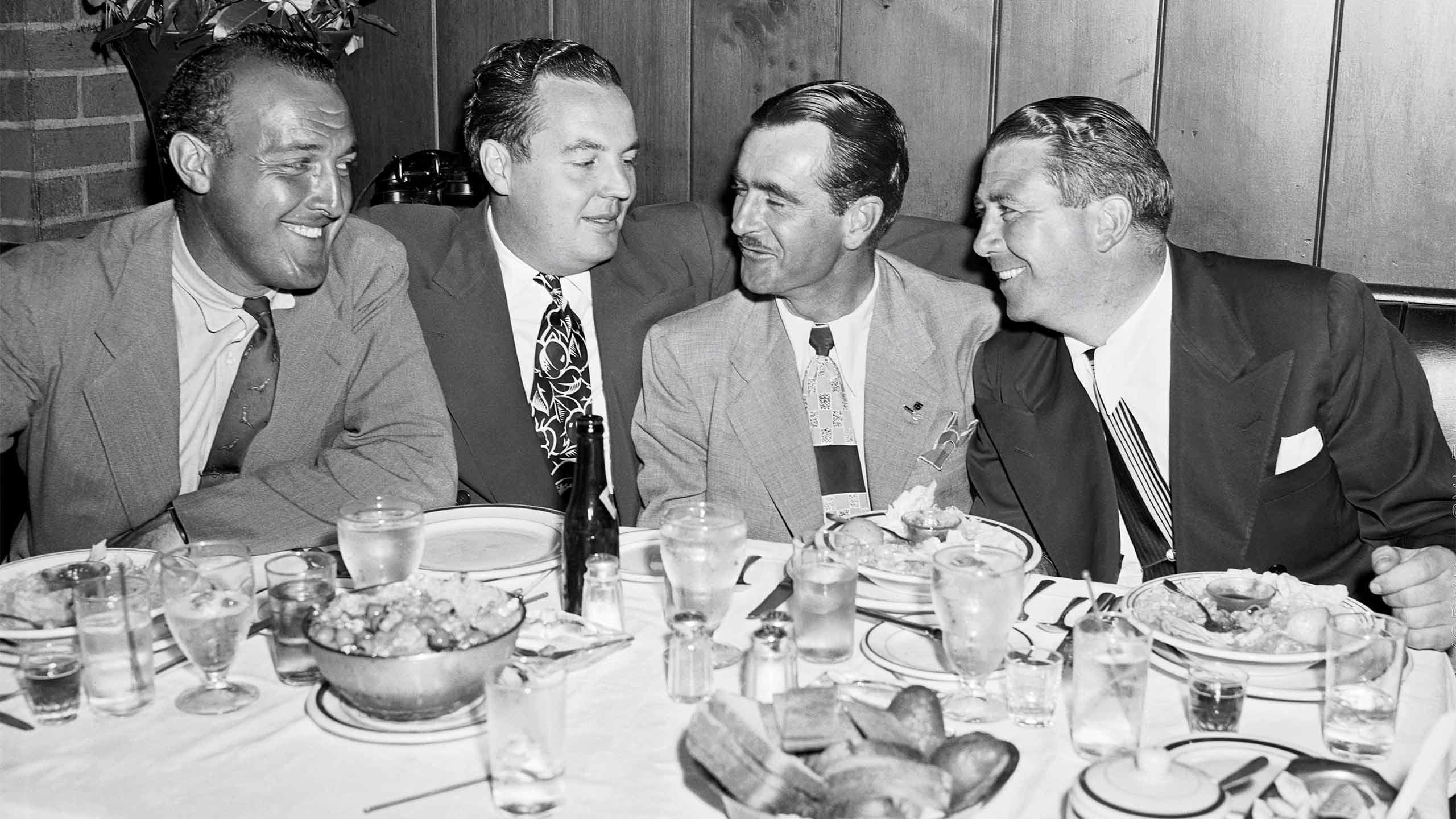 Lloyd Mangrum, new U.S. Open golf champ, celebrates his victory on the links with a few friends.