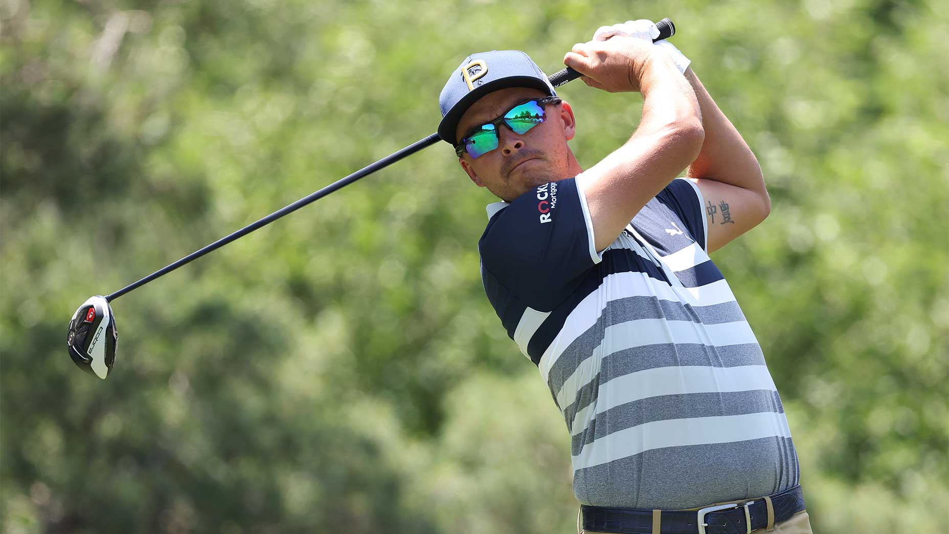 Rickie Fowler tees off