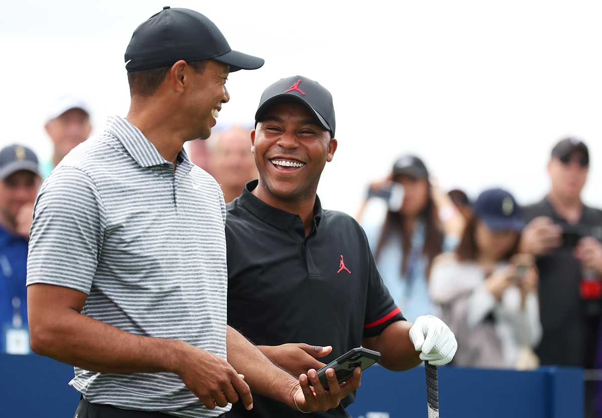 Tiger Woods and Harold Varner at the 2019 Players Championship.