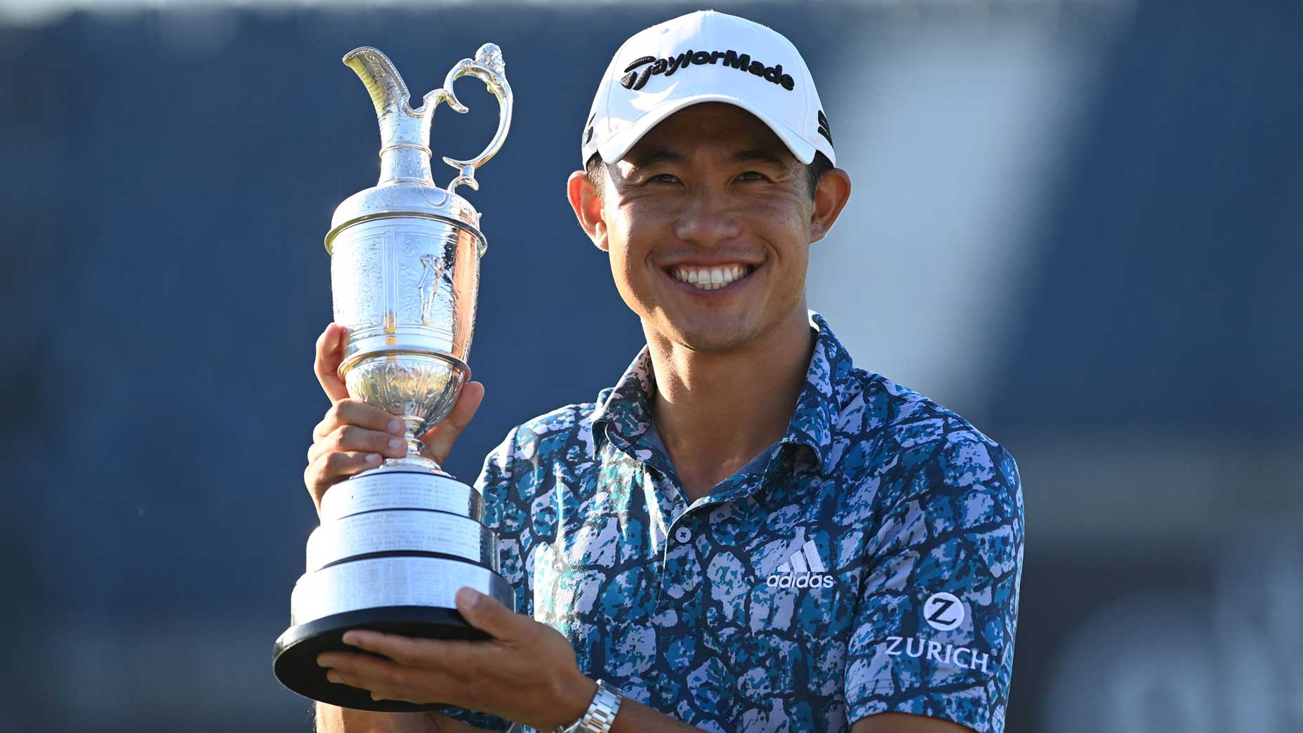 collin morikawa with trophy