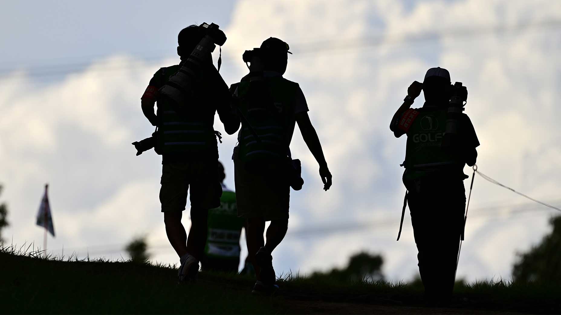 Reporters covering golf