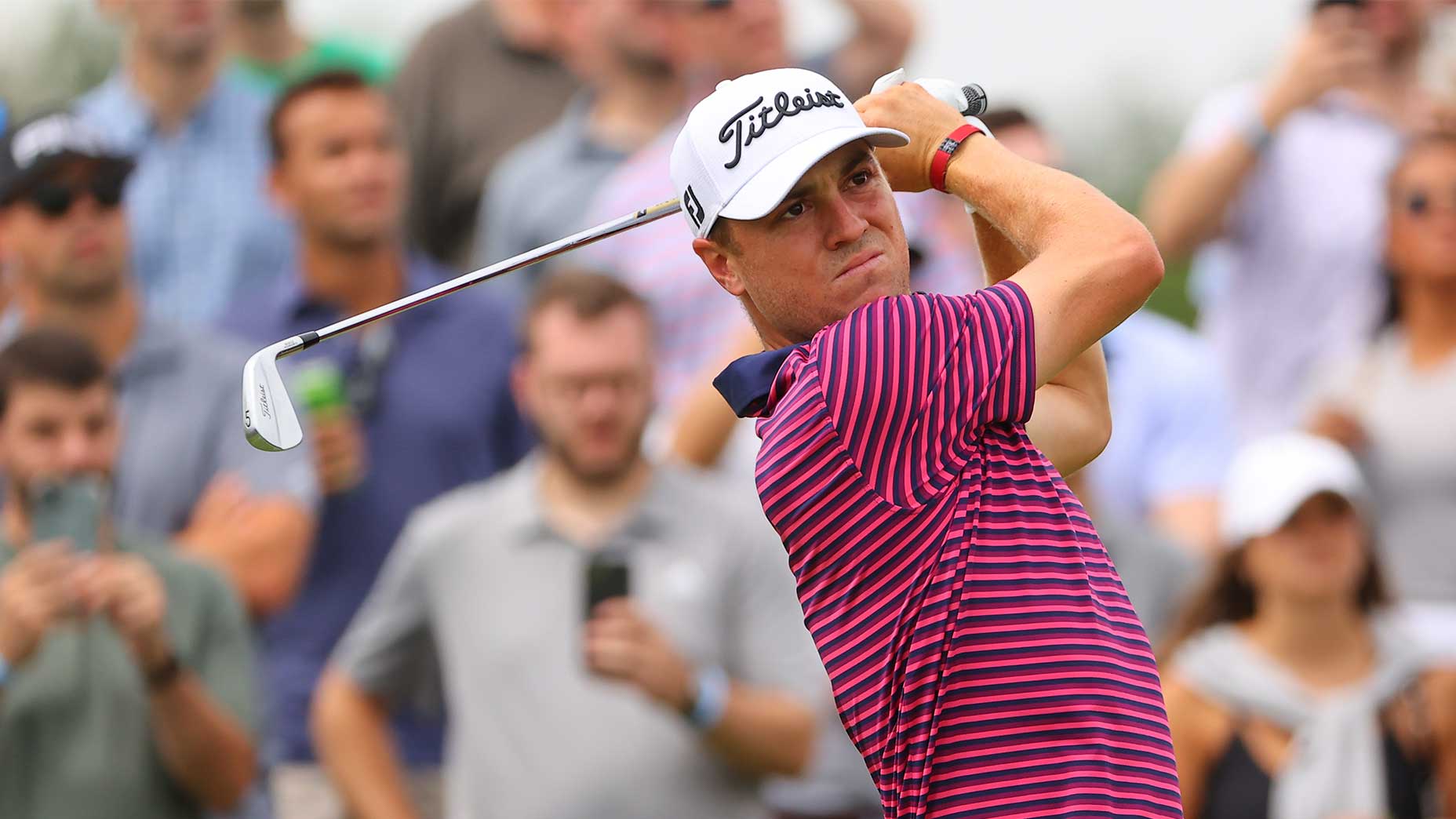 Justin Thomas hits a shot at the 2021 Northern Trust.