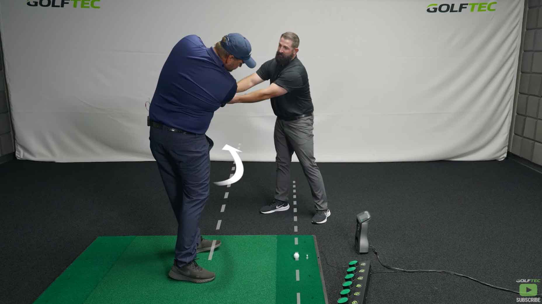 Michael Visacki receives a lesson at GOLFTEC