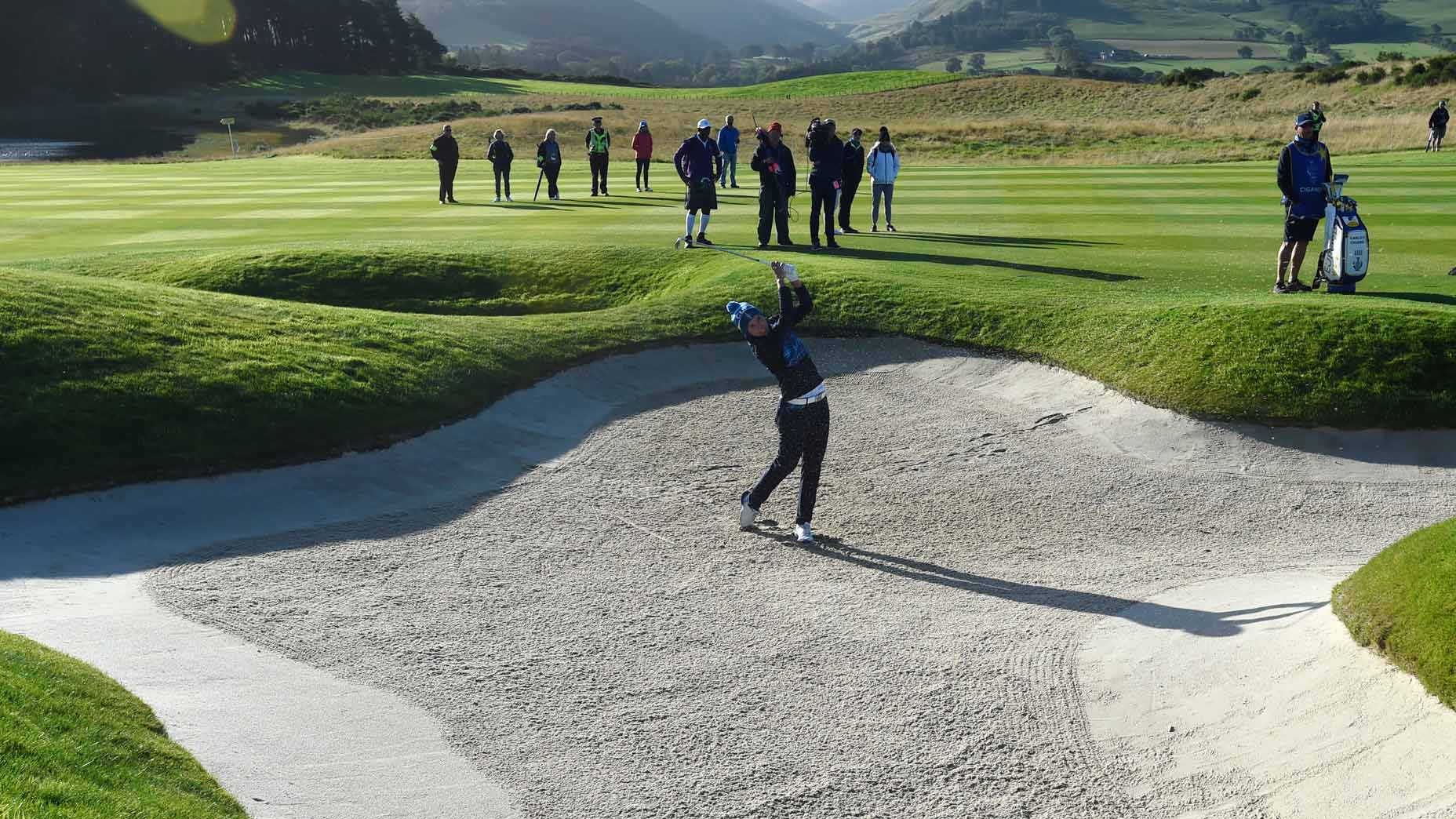 Carlota Ciganda hits from a fairway bunker during the Solheim Cup