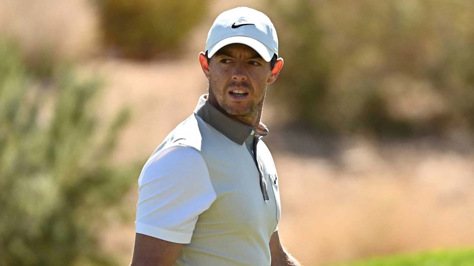 Rory McIlroy of Northern Ireland looks on from the 13th green during the first round of THE CJ CUP @ SUMMIT at The Summit Club