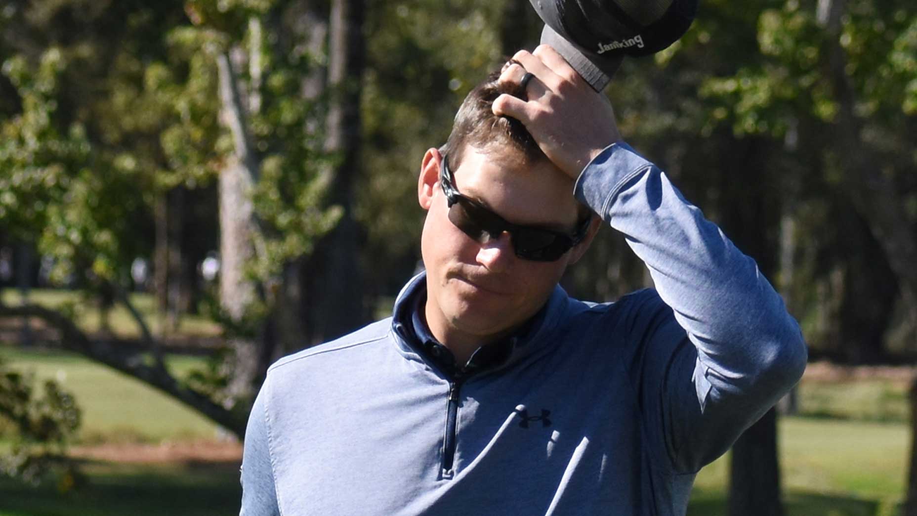 Pro thought he could touch his ball. The rules said otherwise.