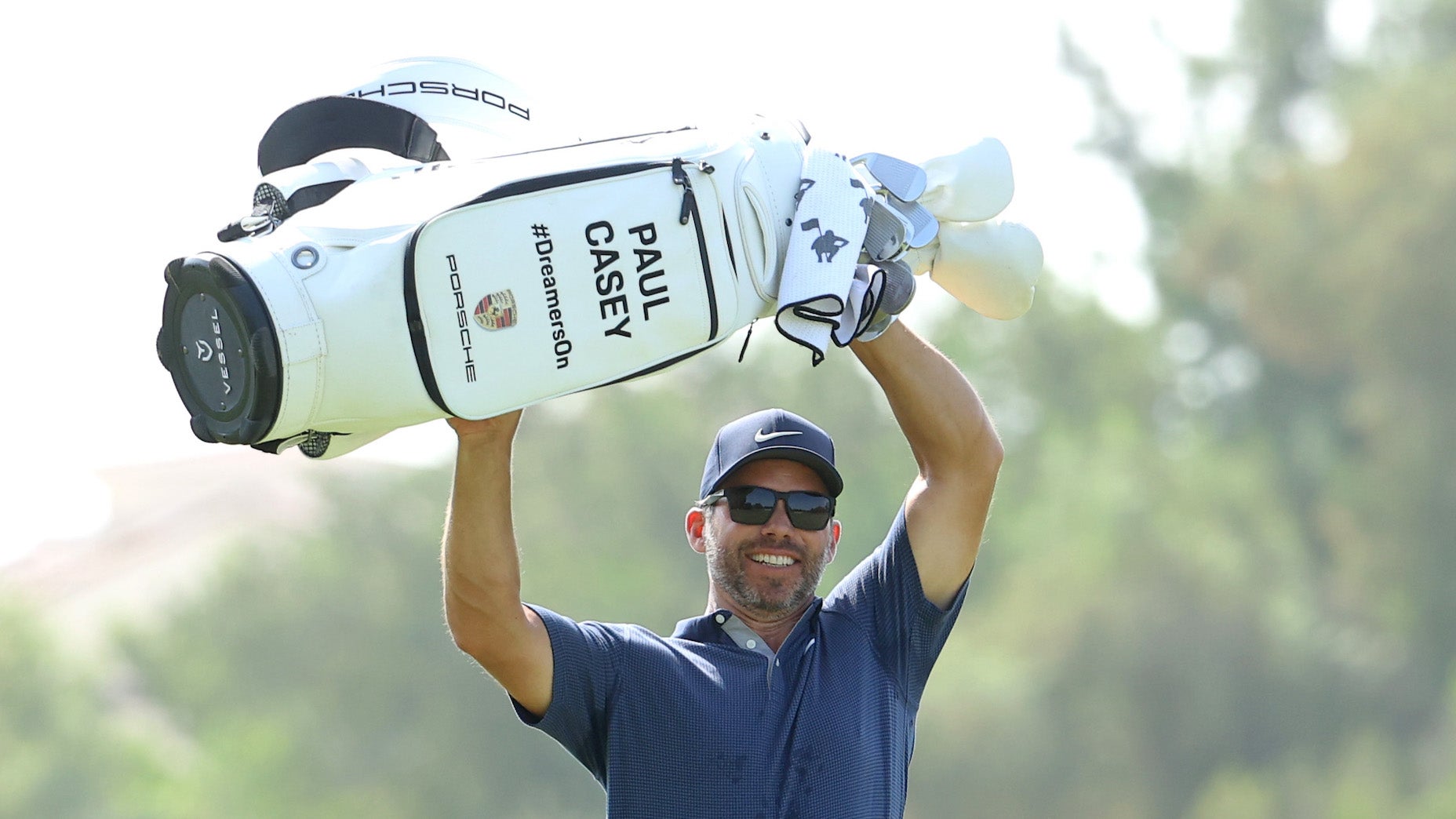Paul Casey lifts golf bag during 2021 DP World Tour Championship