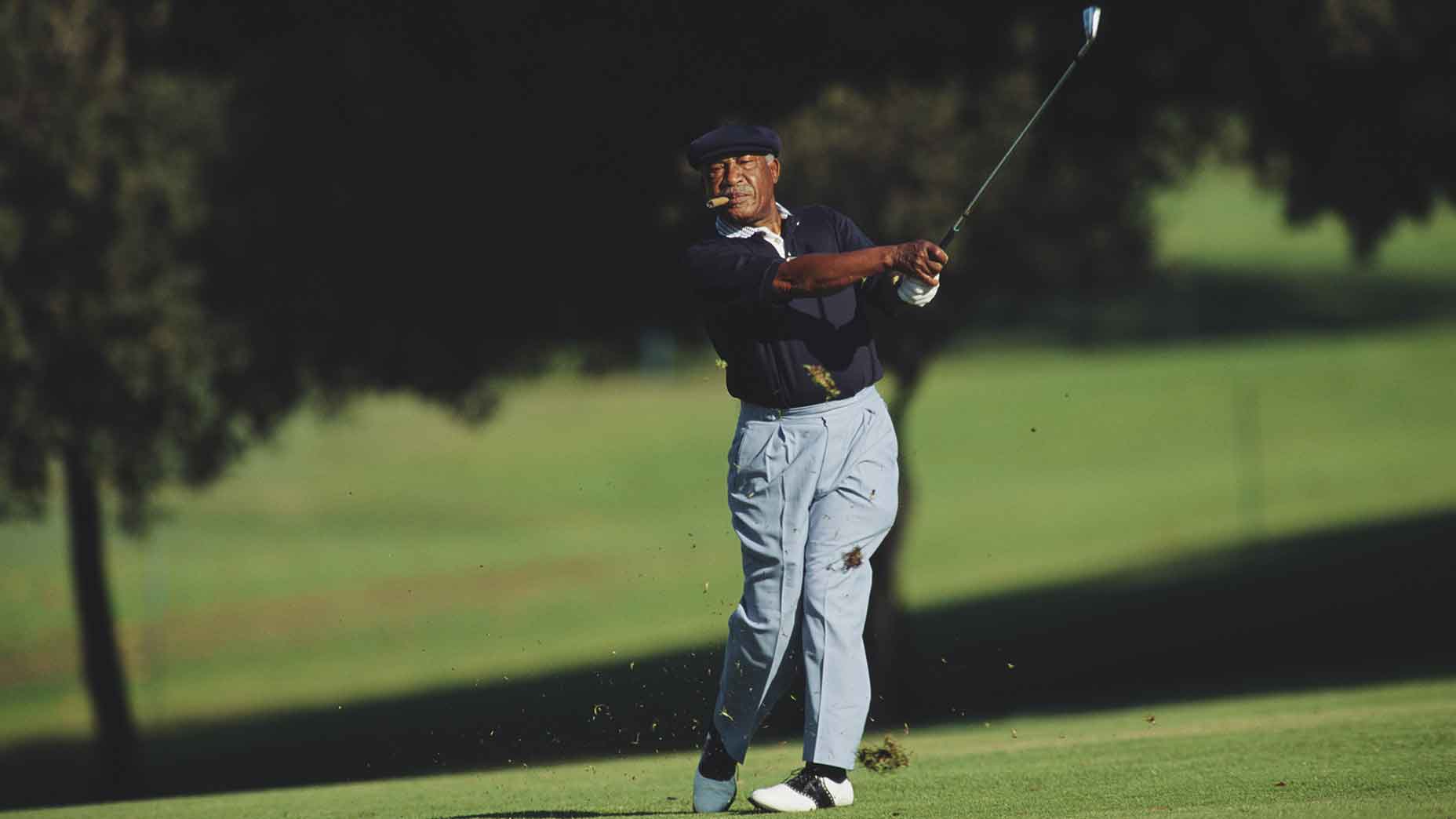 charlie sifford swings iron
