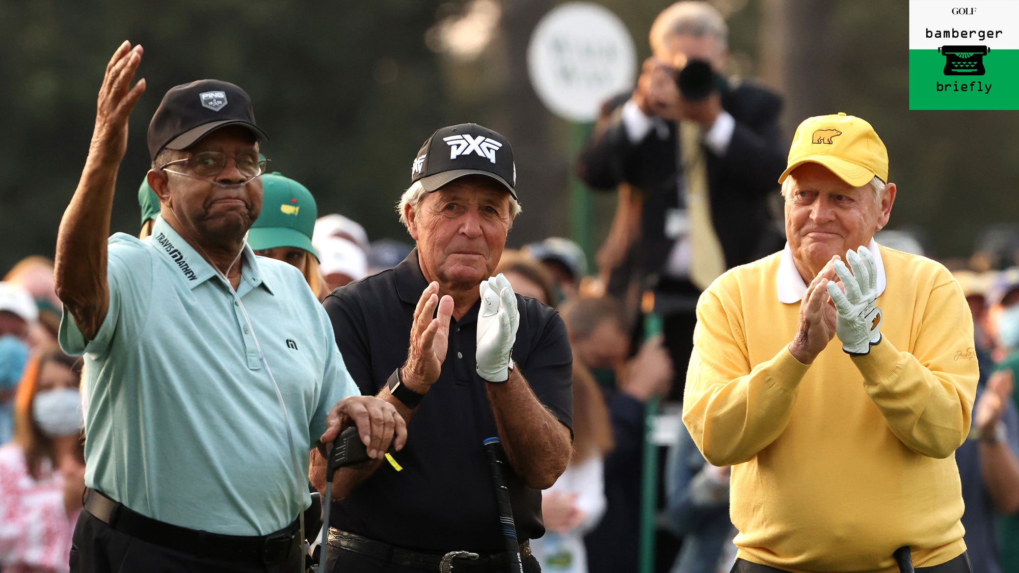 Honorary Starter Lee Elder of the United States (L), waves to the patrons as he is introduced and honorary starter and Masters champion Gary Player of South Africa and honorary starter and Masters champion Jack Nicklaus applaud from the first tee during the opening ceremony prior to the start of the first round of the Masters at Augusta National Golf Club on April 08, 2021 in Augusta, Georgia