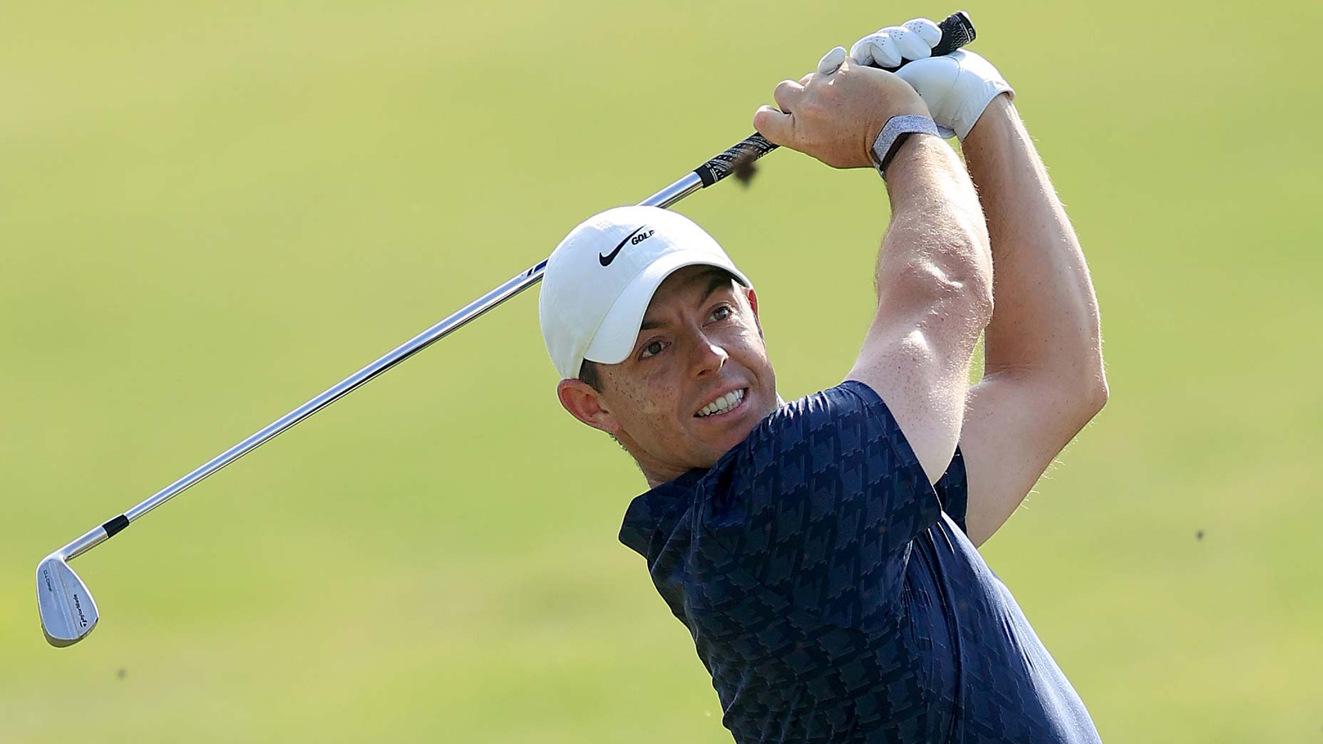 Rory McIlroy hits iron shot during 2021 DP World Tour Championship