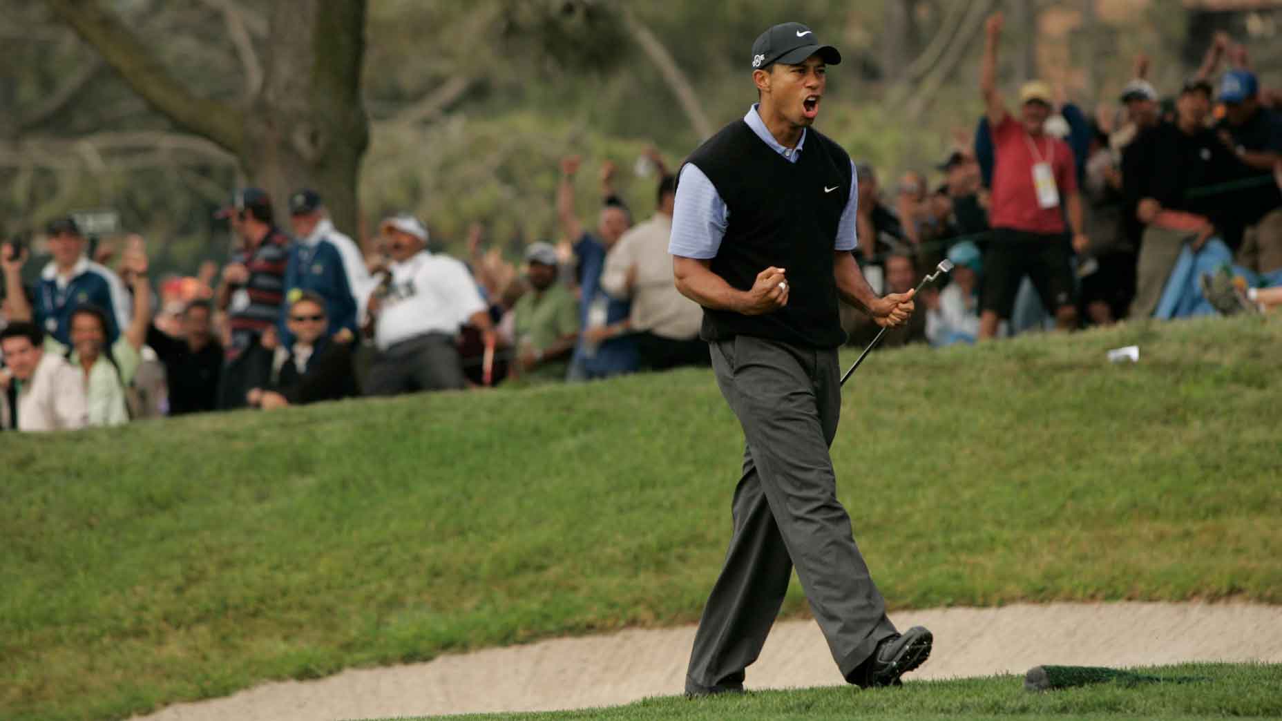 Tiger Woods pumps his fist