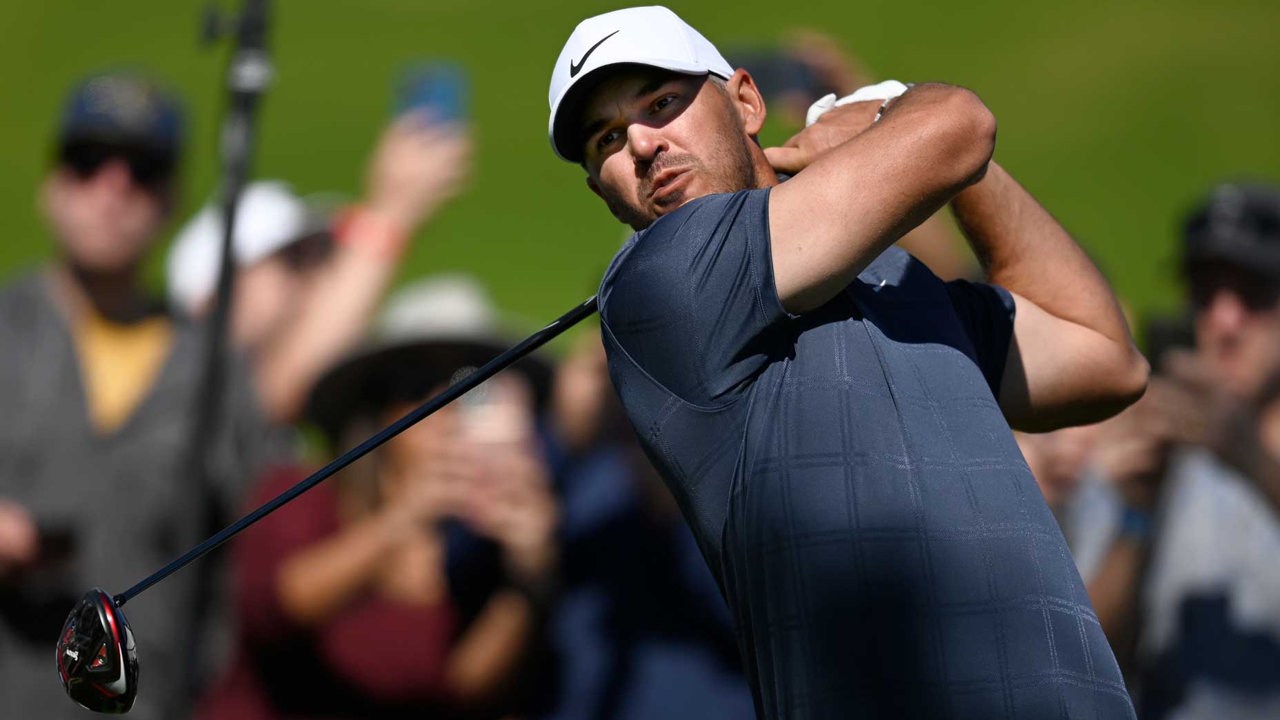 Brooks Koepka hits driver during 2022 Genesis Invitational