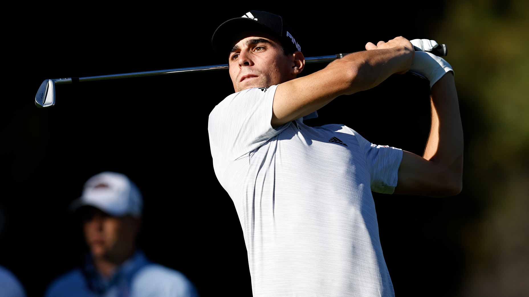Joaquin Niemann plays shot during first round of 2022 Genesis Invitational
