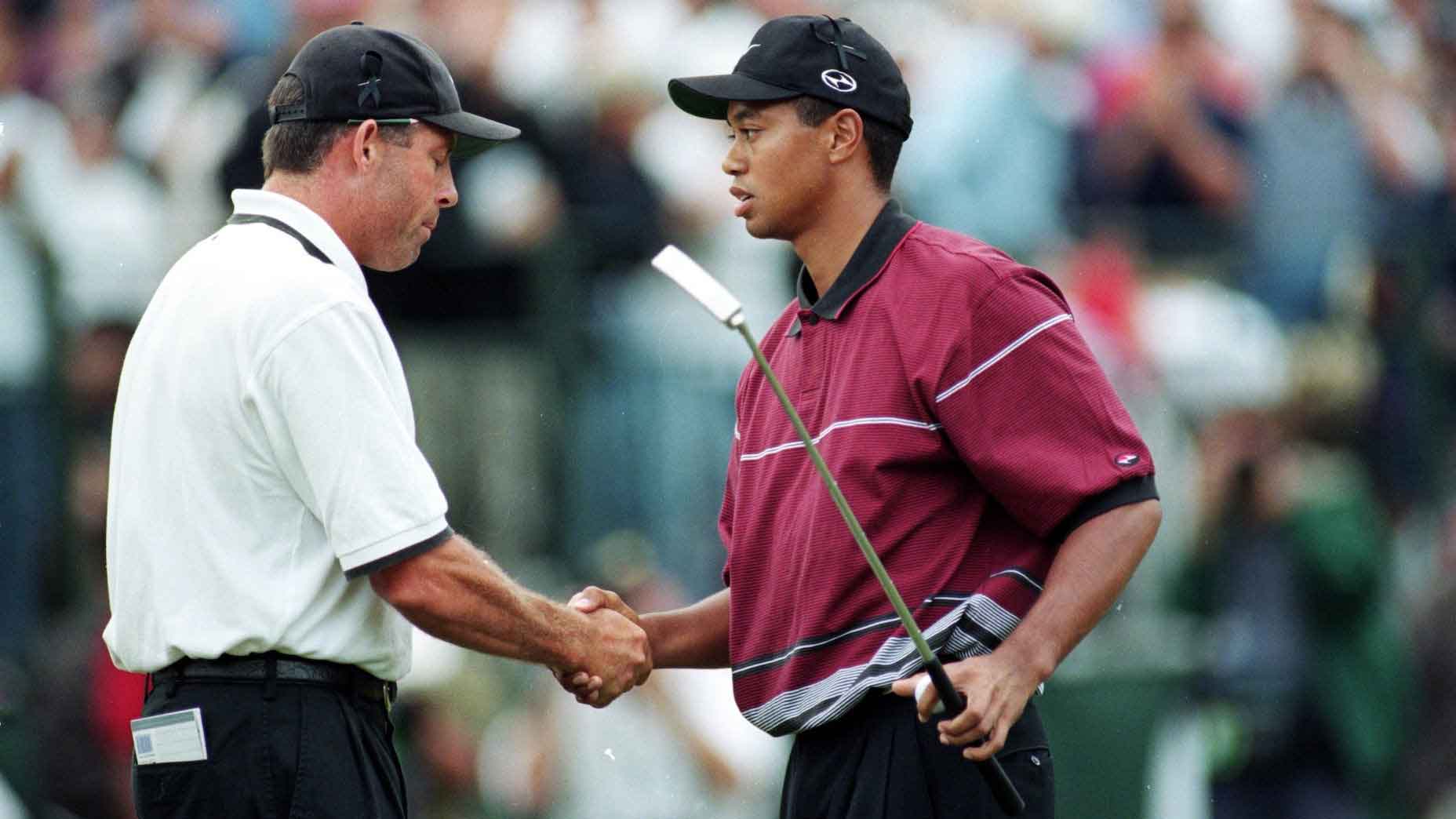 tiger woods shakes steve williams' hand