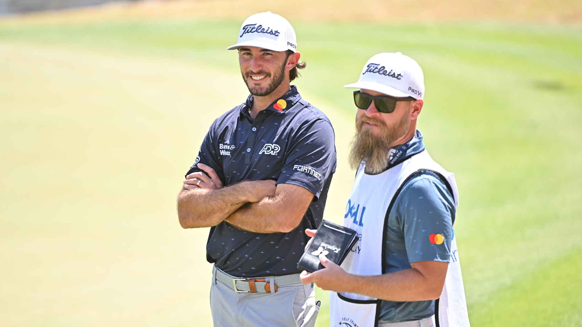 Max Homa and caddie