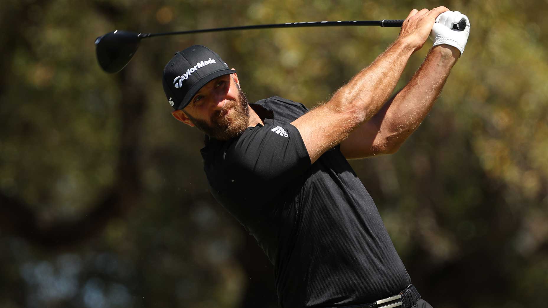 Dustin Johnson hits drive during 2022 WGC-Dell Technologies Match Play