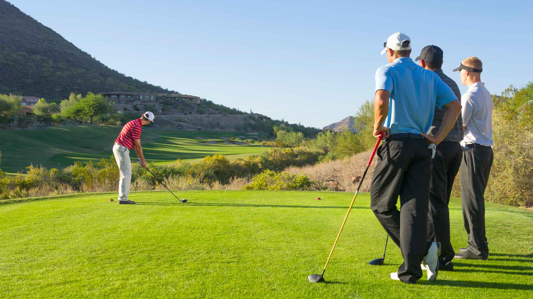 golfers on tee