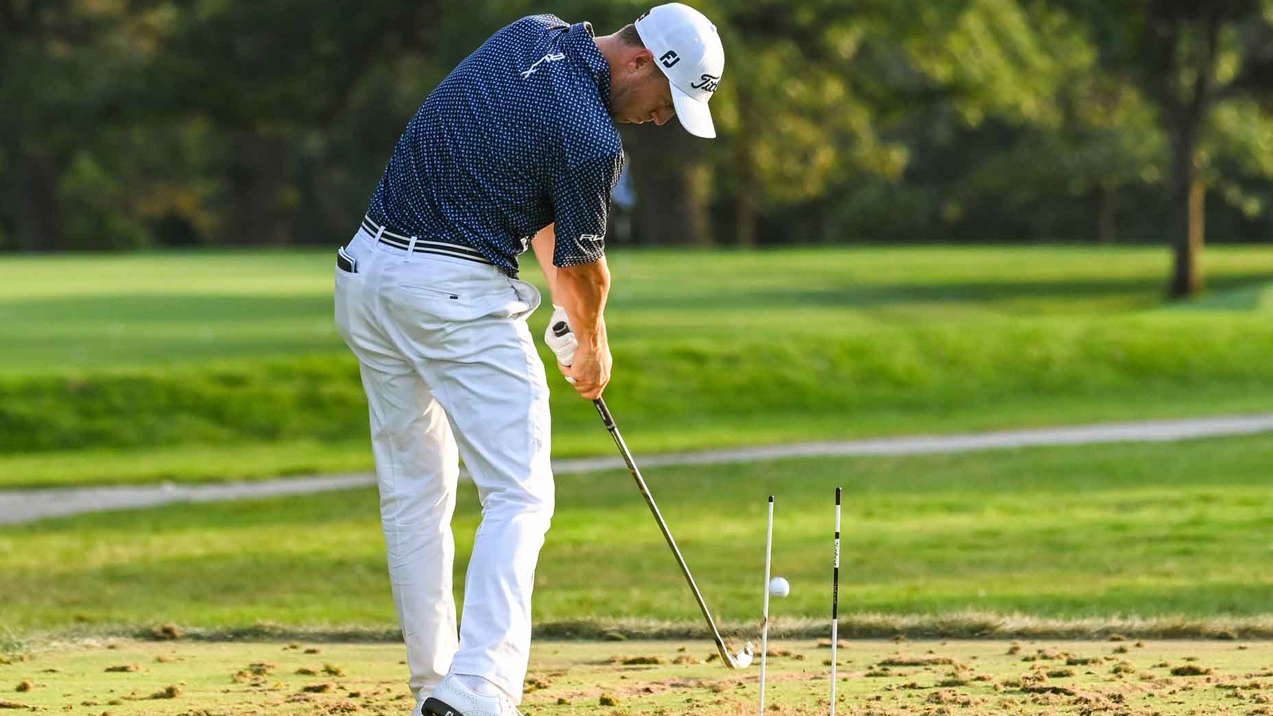 justin thomas hits ball