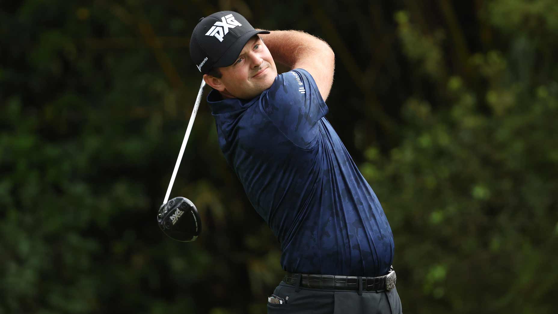 Patrick Reed hits tee shot during 2022 Players Championship