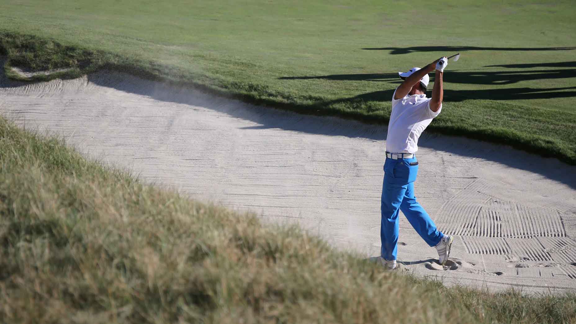 golfer in bunker