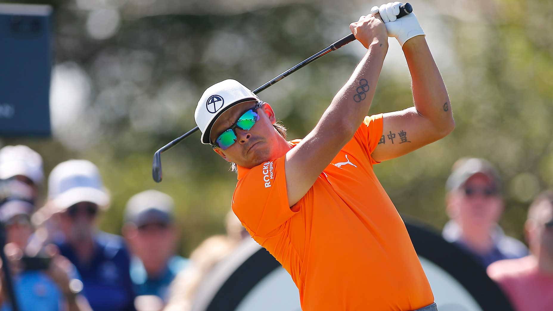 Rickie Fowler hits iron shot during 2022 Arnold Palmer Invitational
