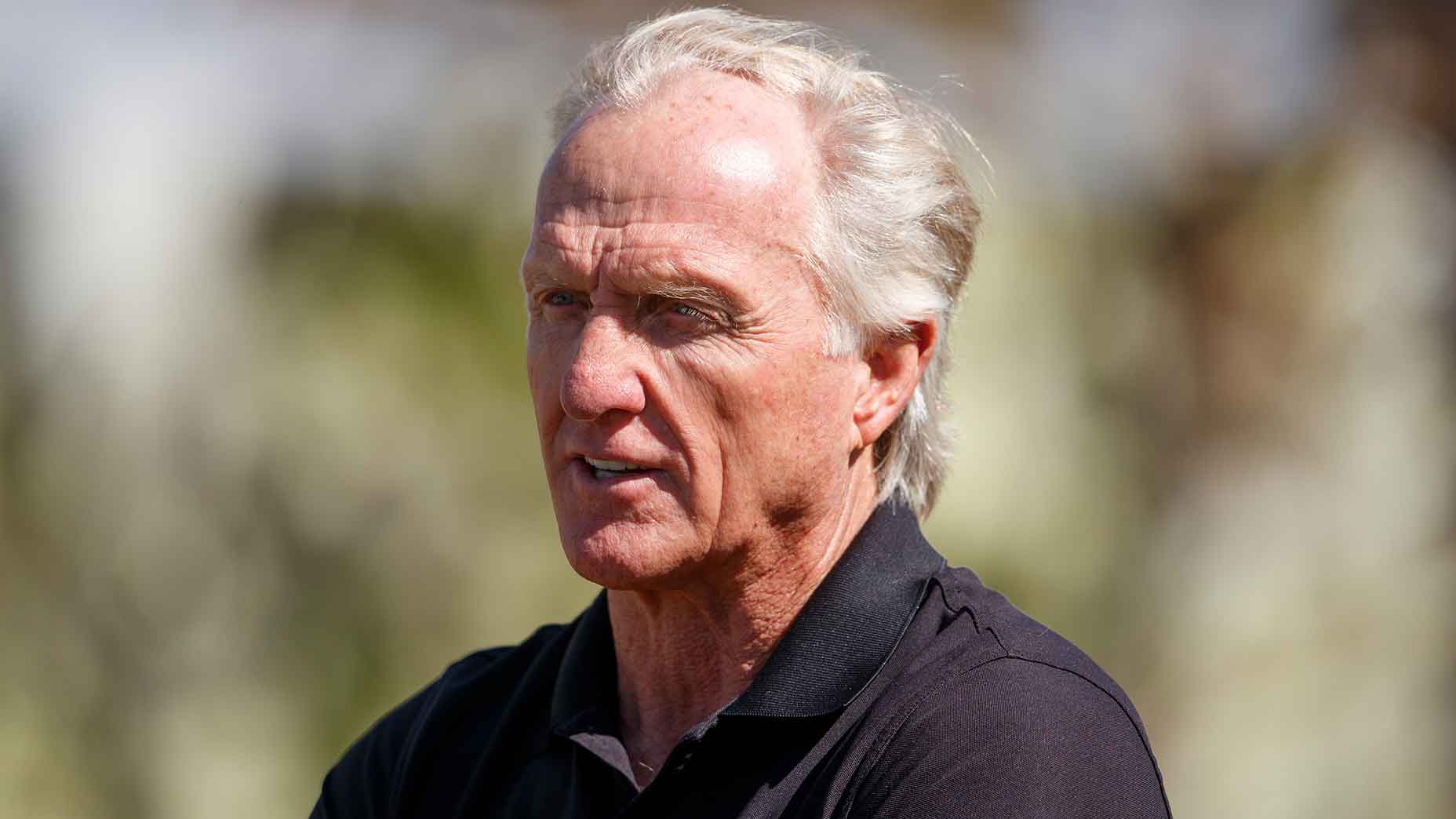 greg norman stares into the distance