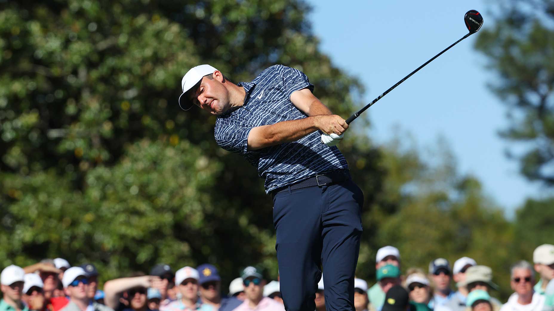 Scottie Scheffler hits a drive on sunday at the masters.
