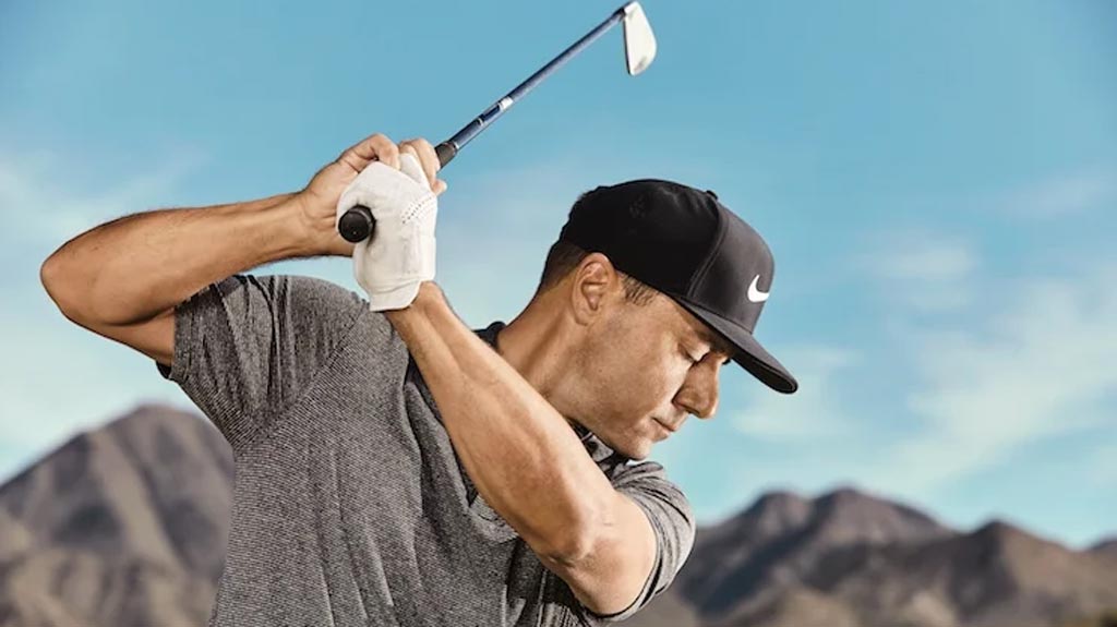 Golf Instructor Martin Chuck swings golf club