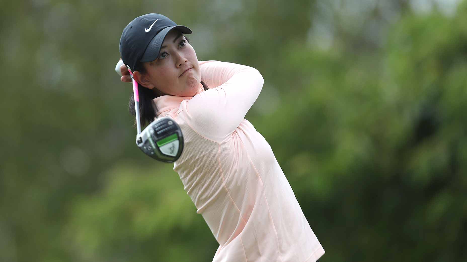 Michelle Wie West watches a tee shot.