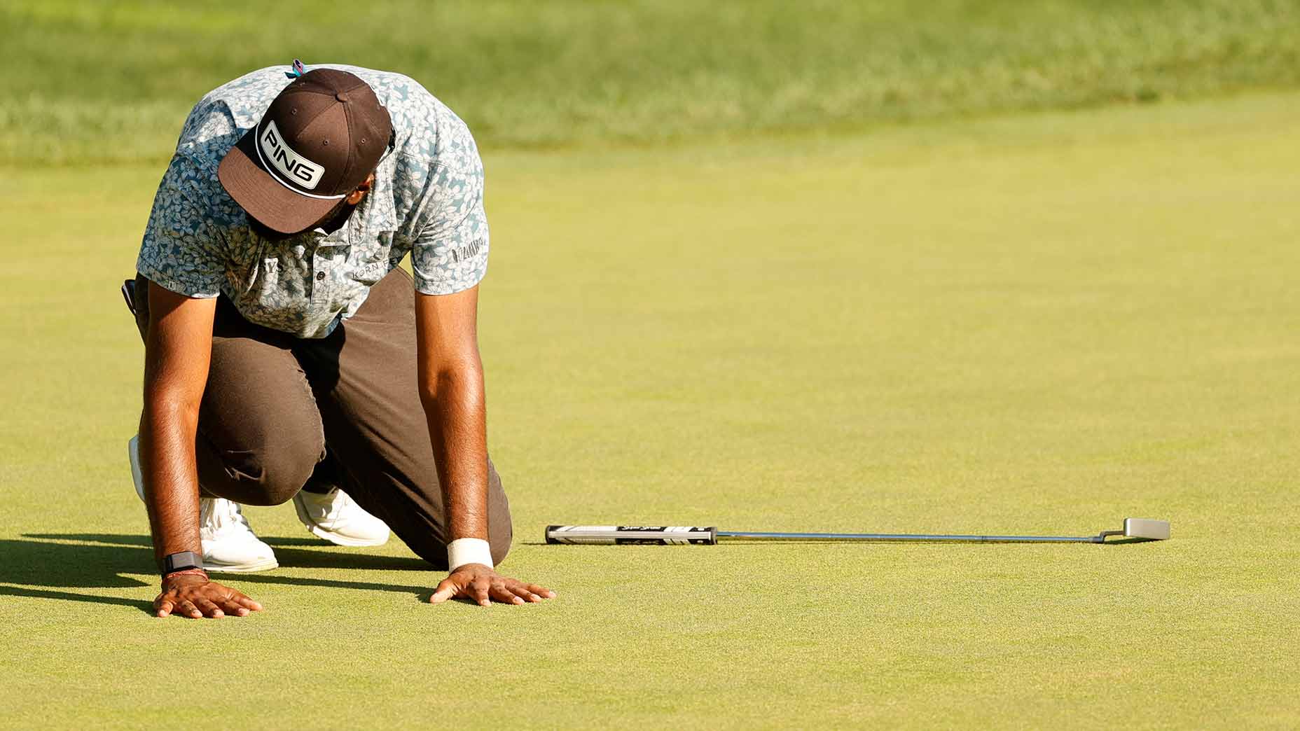 Sahith Theegala reacts to missing a bogey putt on the 72nd hole of the Travelers.