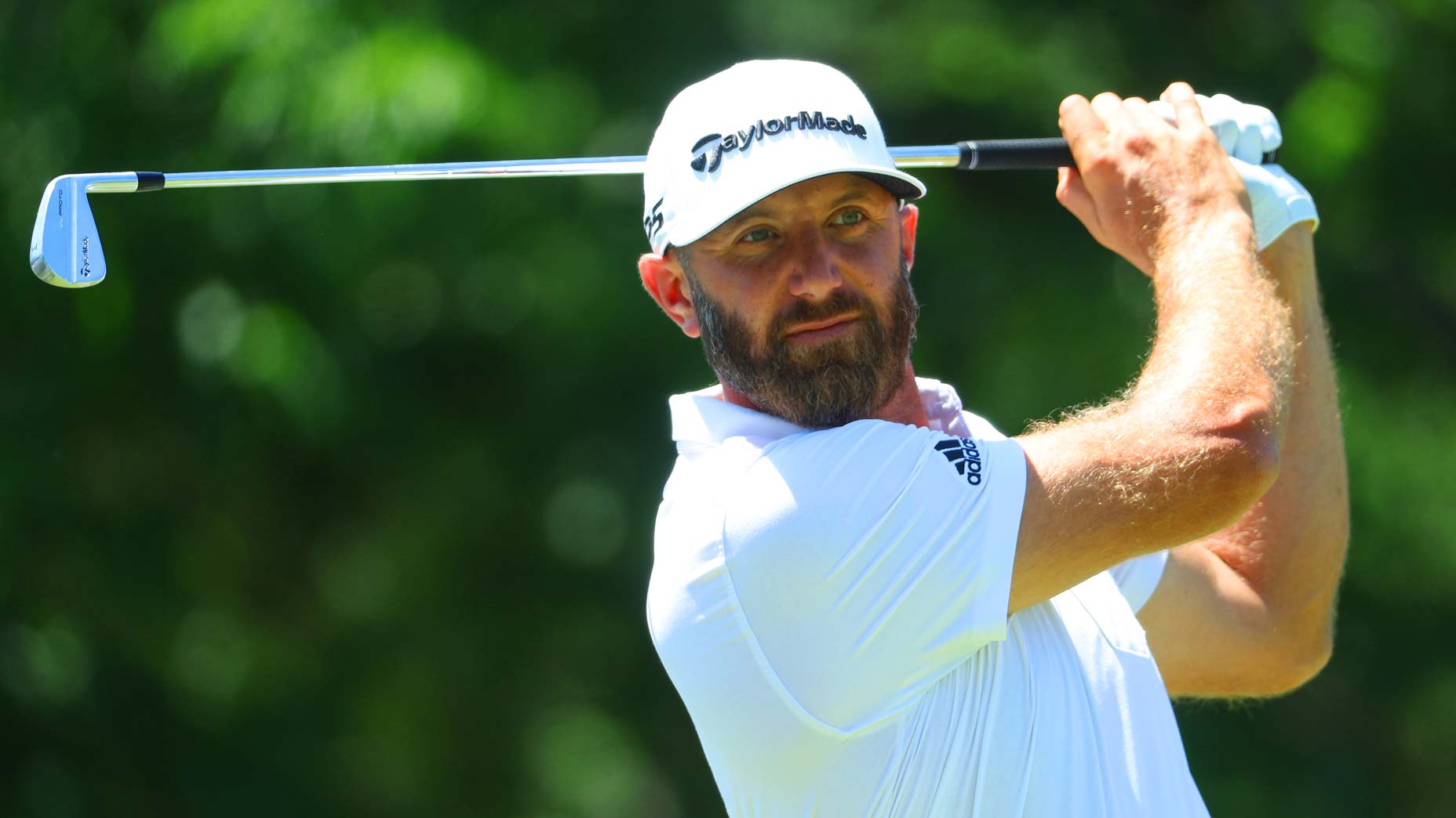 Dustin Johnson hits iron during 2022 PGA Championship