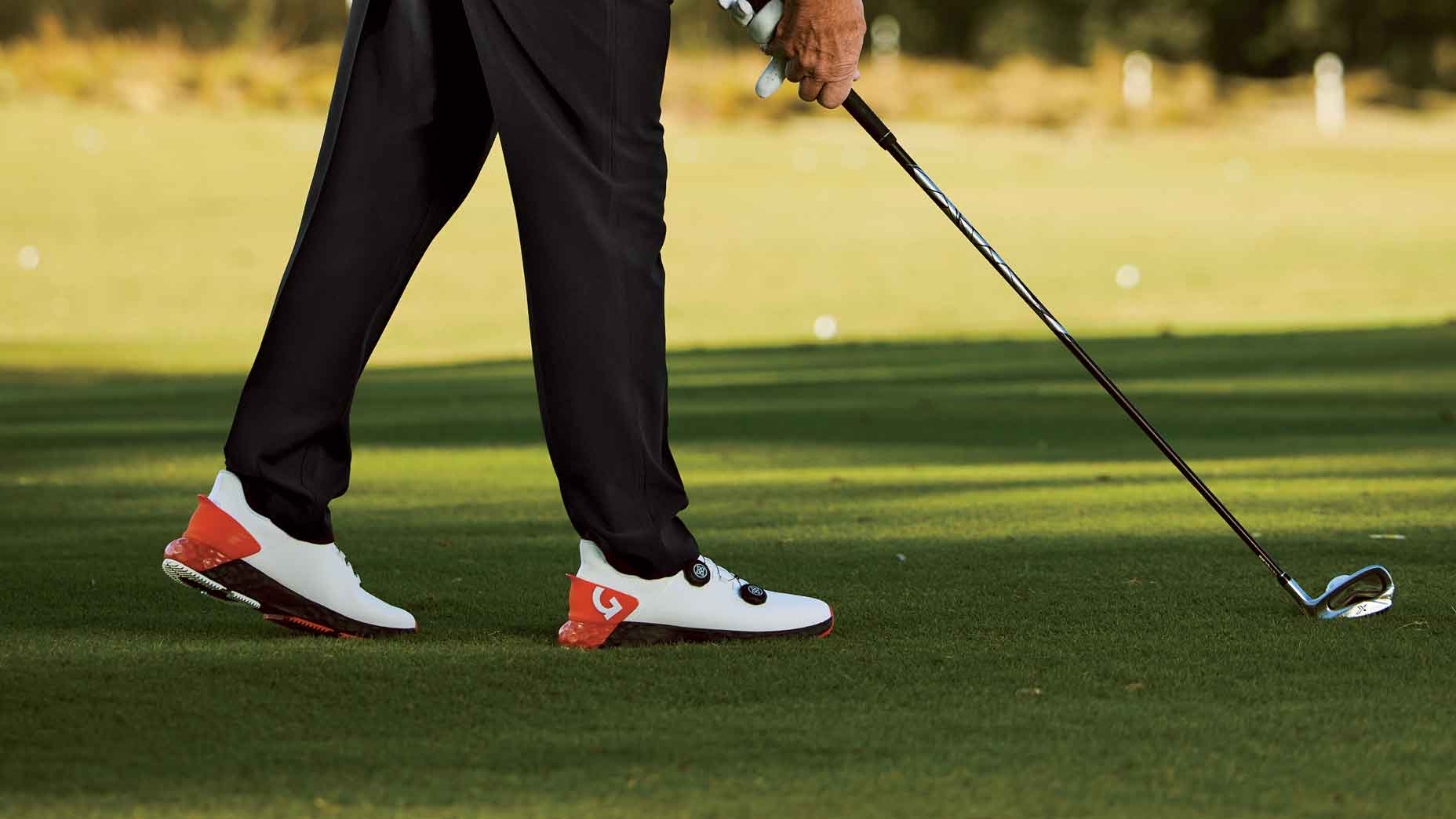 feet and golf club