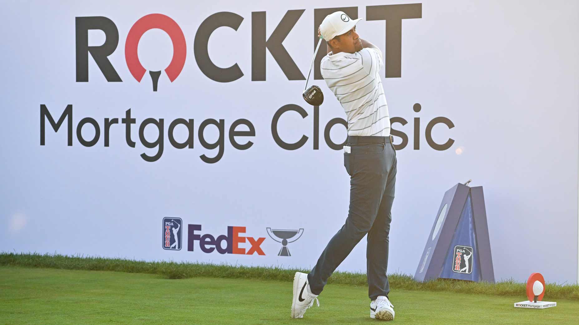 Tony Finau hits drive at 2022 Rocket Mortgage Classic