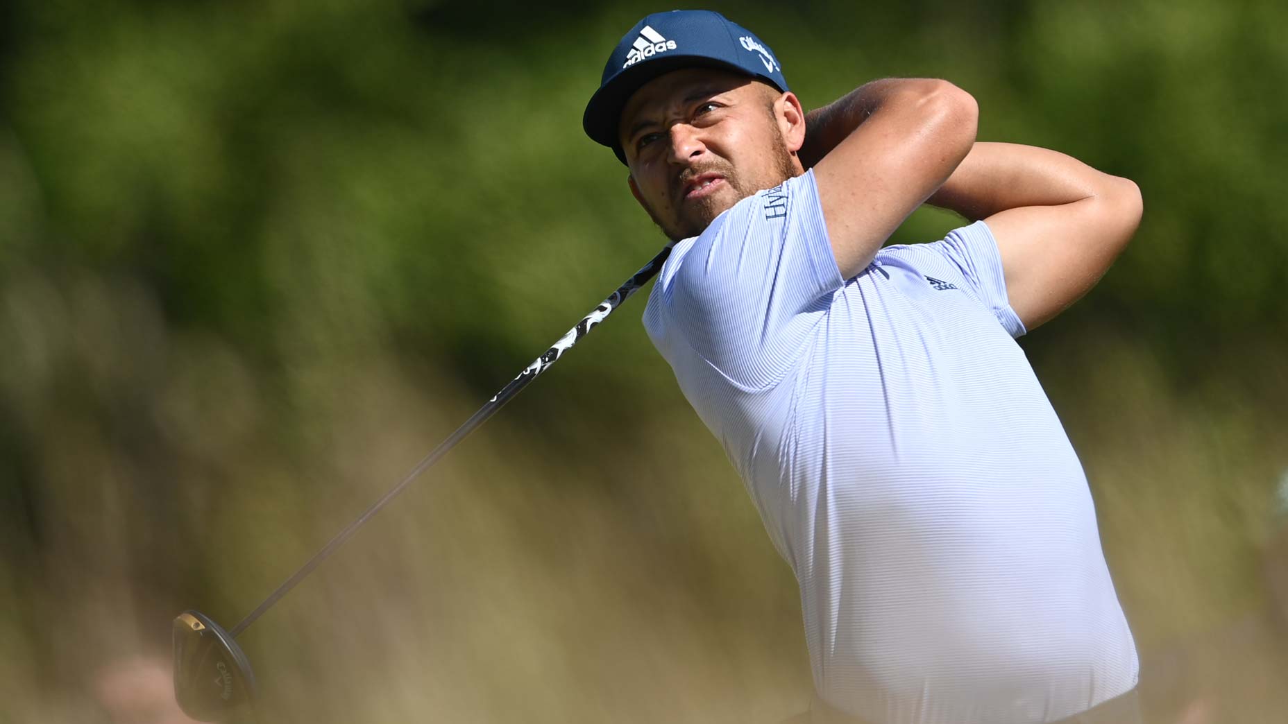 Xander Schauffele hits drive during 2022 Genesis Scottish Open