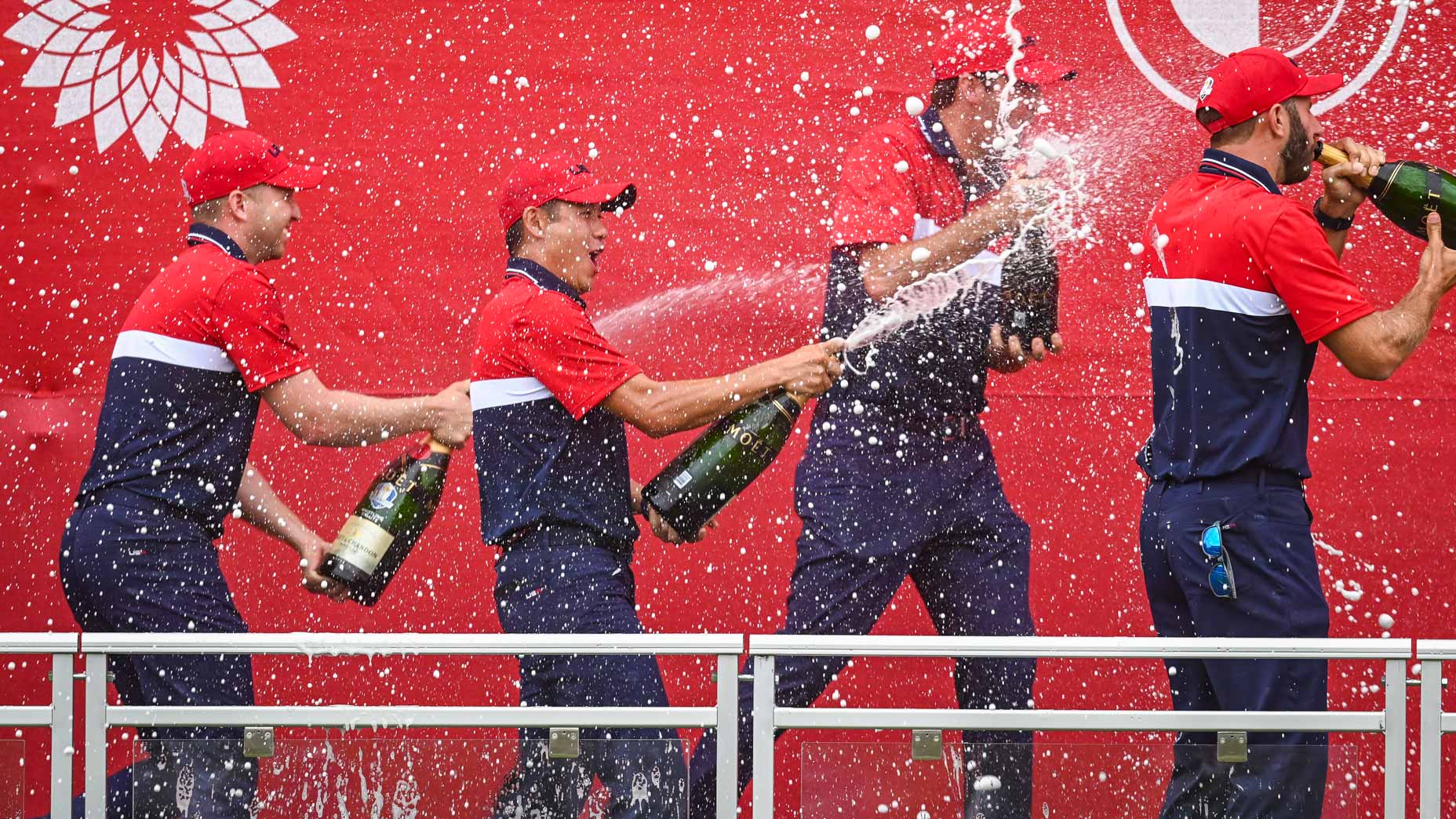 Members of the 2021 U.S. Ryder Cup Team celebrate with champagne