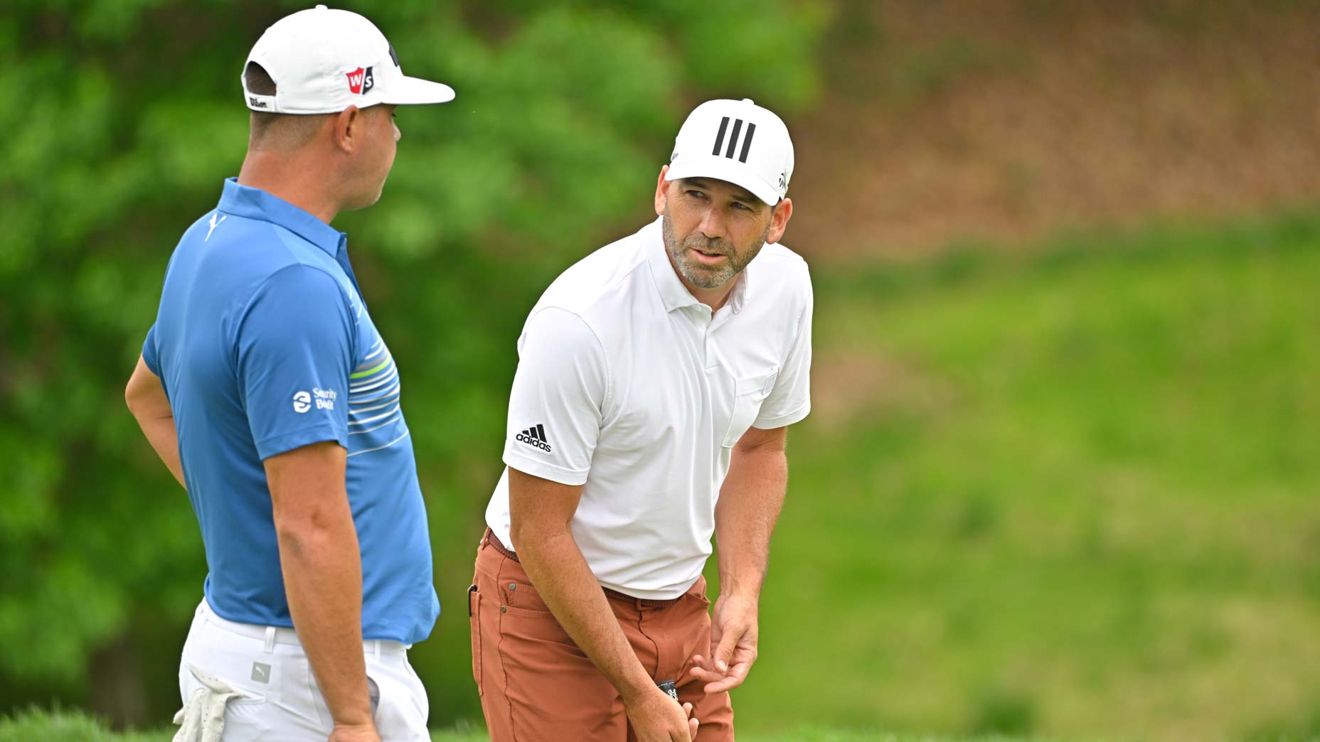 Sergio Garcia talks to Gary Woodland